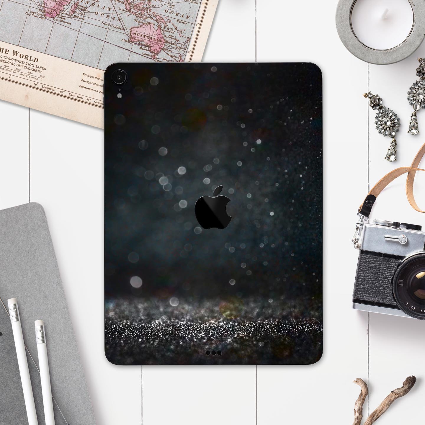 Black Unfocused Glowing Shimmer skin decal for Apple devices, showcasing its sleek design and premium finish.