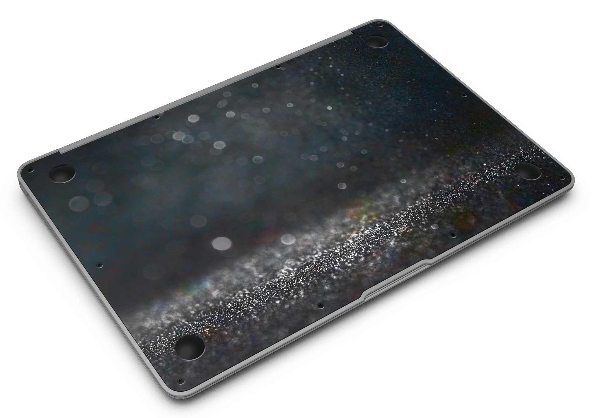 Black Unfocused Glowing Shimmer skin applied to a MacBook Air, showcasing its sleek design and vibrant shimmer effect.