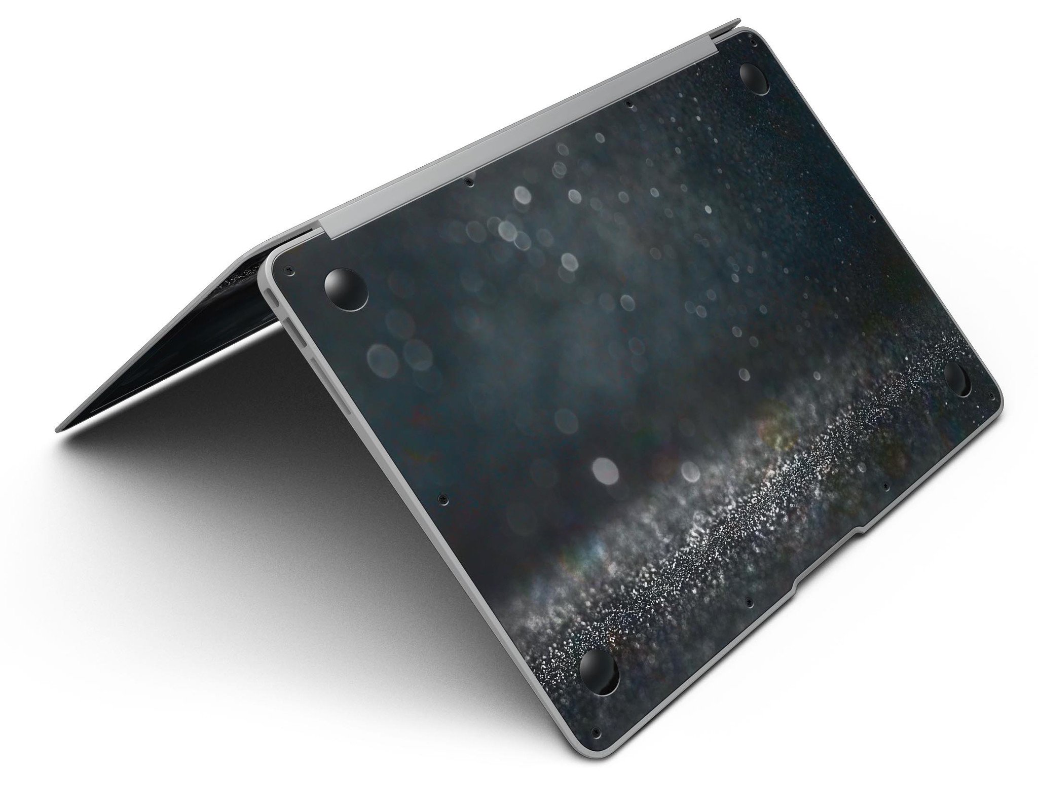 Black Unfocused Glowing Shimmer skin applied to a MacBook Air, showcasing its sleek design and vibrant shimmer effect.