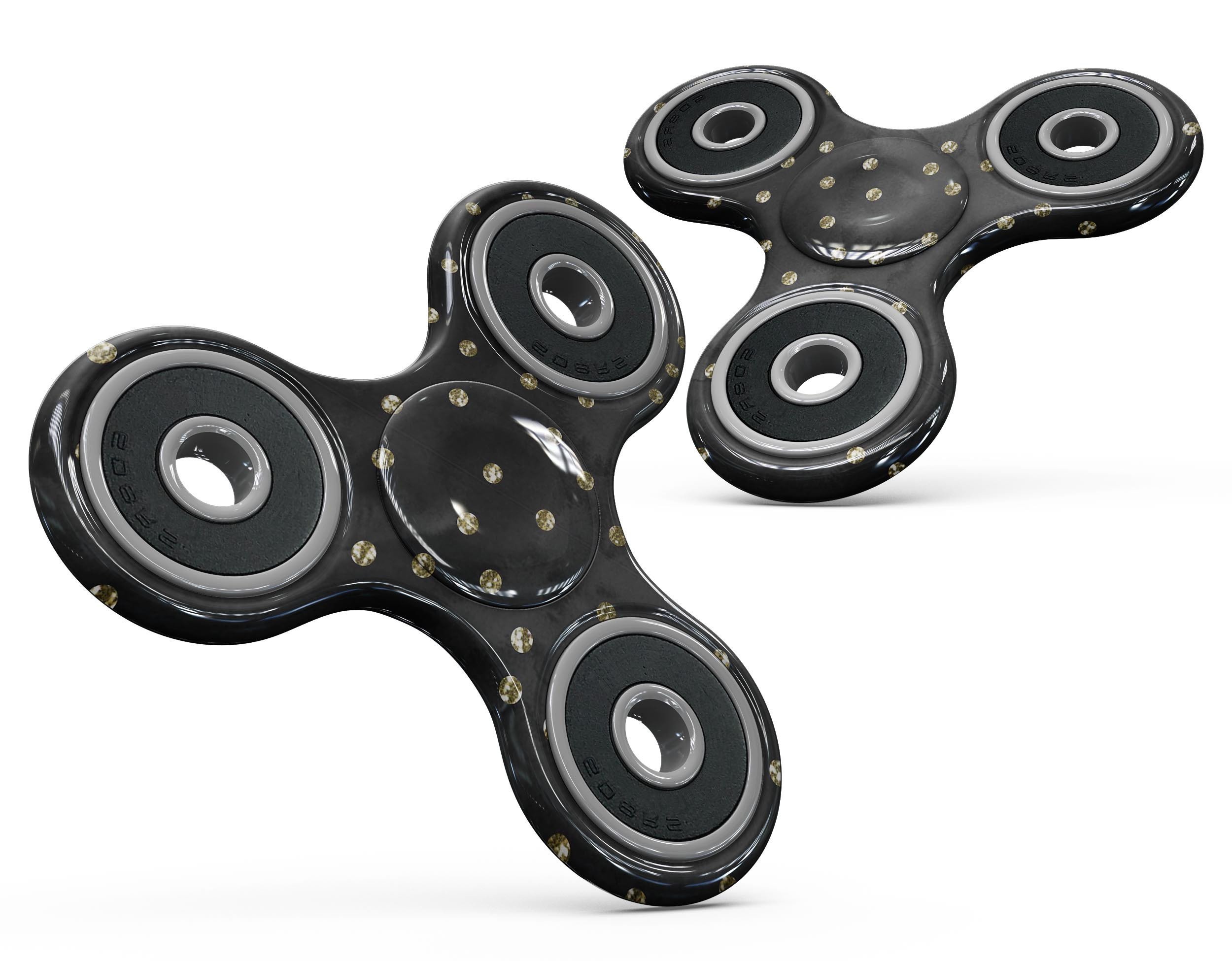 Black fidget spinner skin with watercolor design and gold glimmer polka dots, showcasing vibrant colors and a stylish pattern.