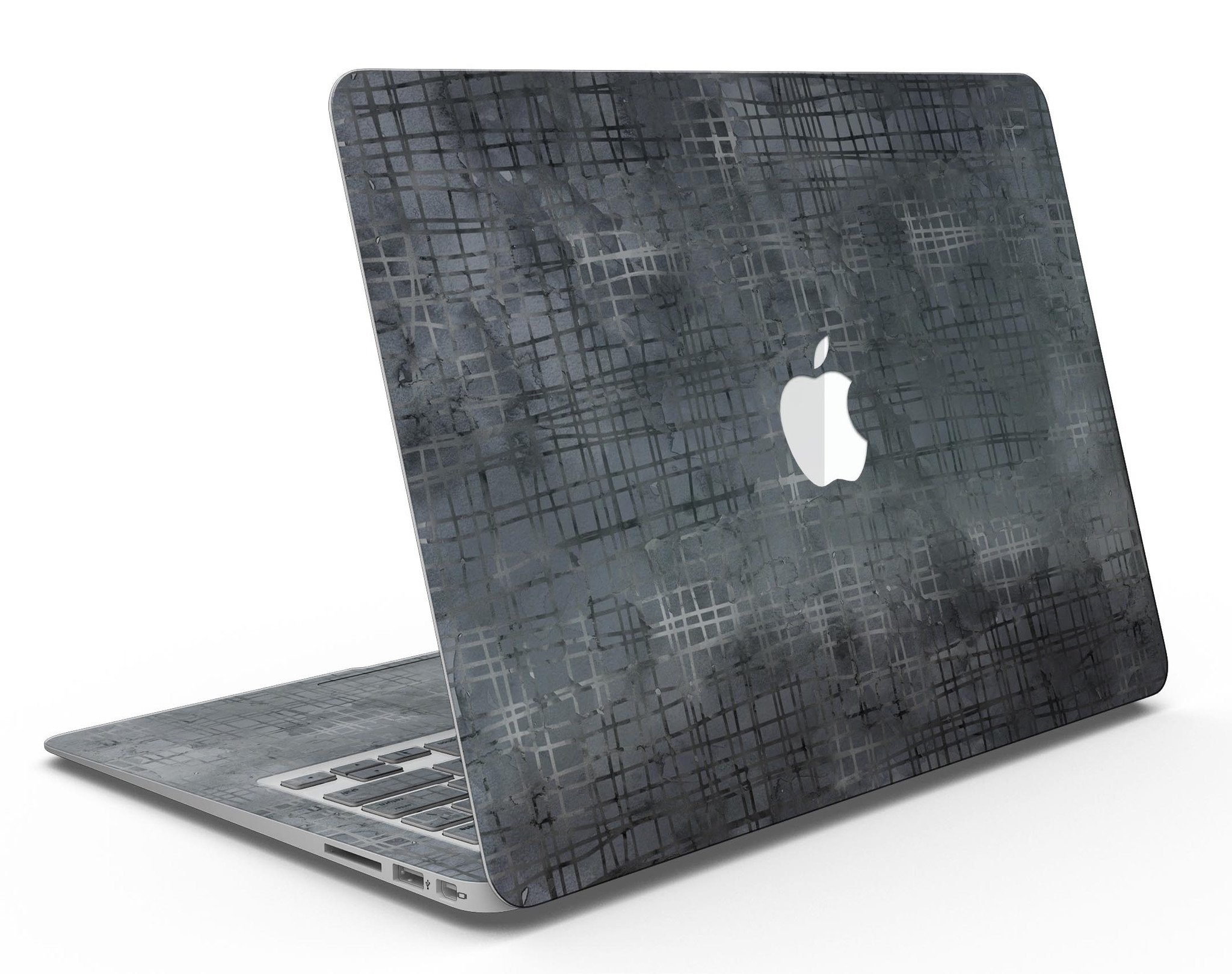 Black Watercolor Cross Hatch skin applied on a MacBook Air, showcasing its stylish design and precise fit.
