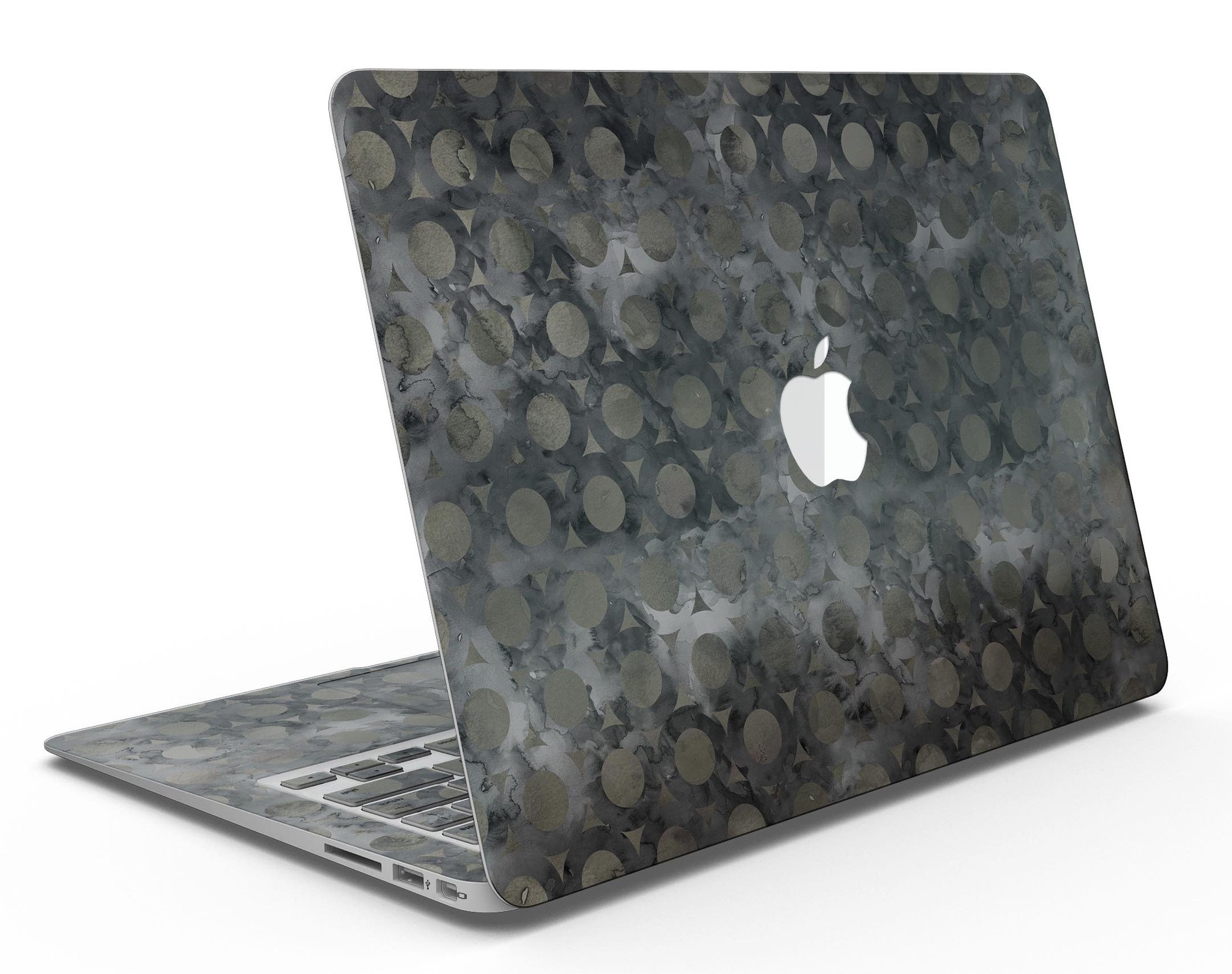 Black Watercolor Ring Pattern MacBook Air Skin Kit showcasing a stylish design on a sleek laptop.