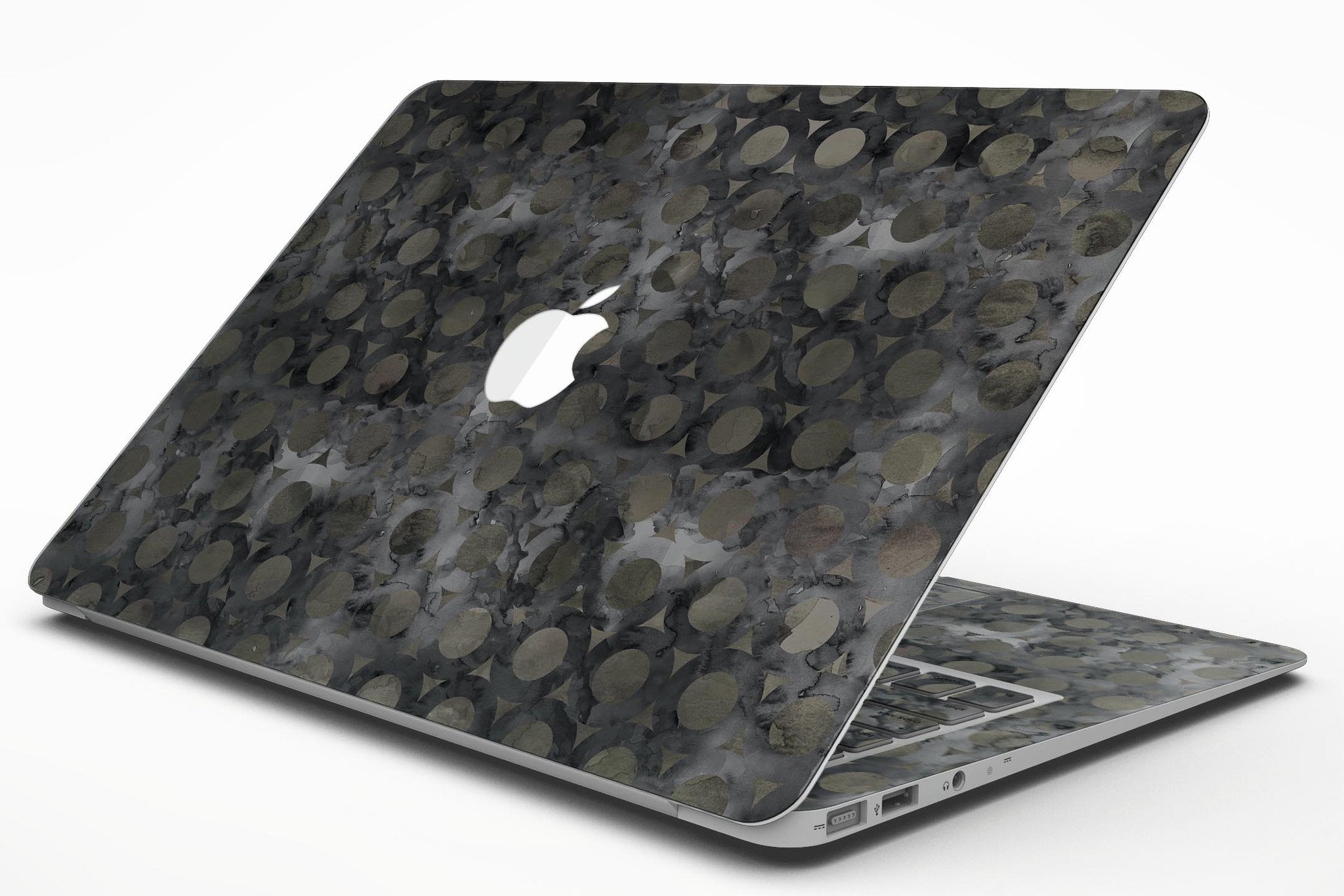 Black Watercolor Ring Pattern MacBook Air Skin Kit showcasing a stylish design on a sleek laptop.