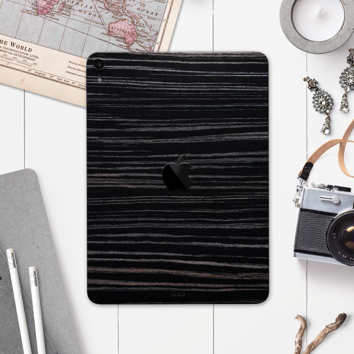 Black Wood Texture skin decal for Apple iPad Pro, showcasing a stylish wood grain design.