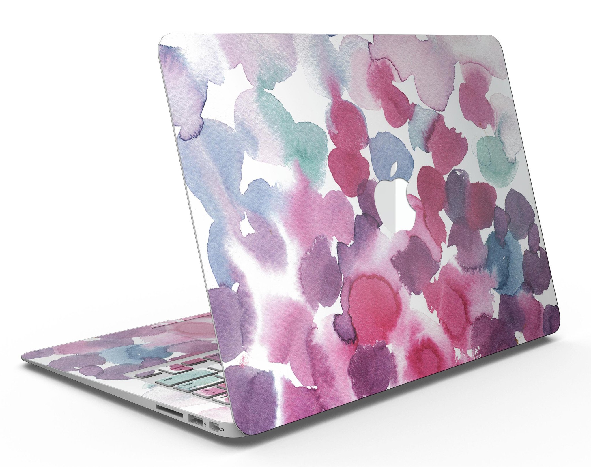 Blot 4 Absorbed Watercolor Texture skin applied to a MacBook Air, showcasing vibrant colors and a sleek design.