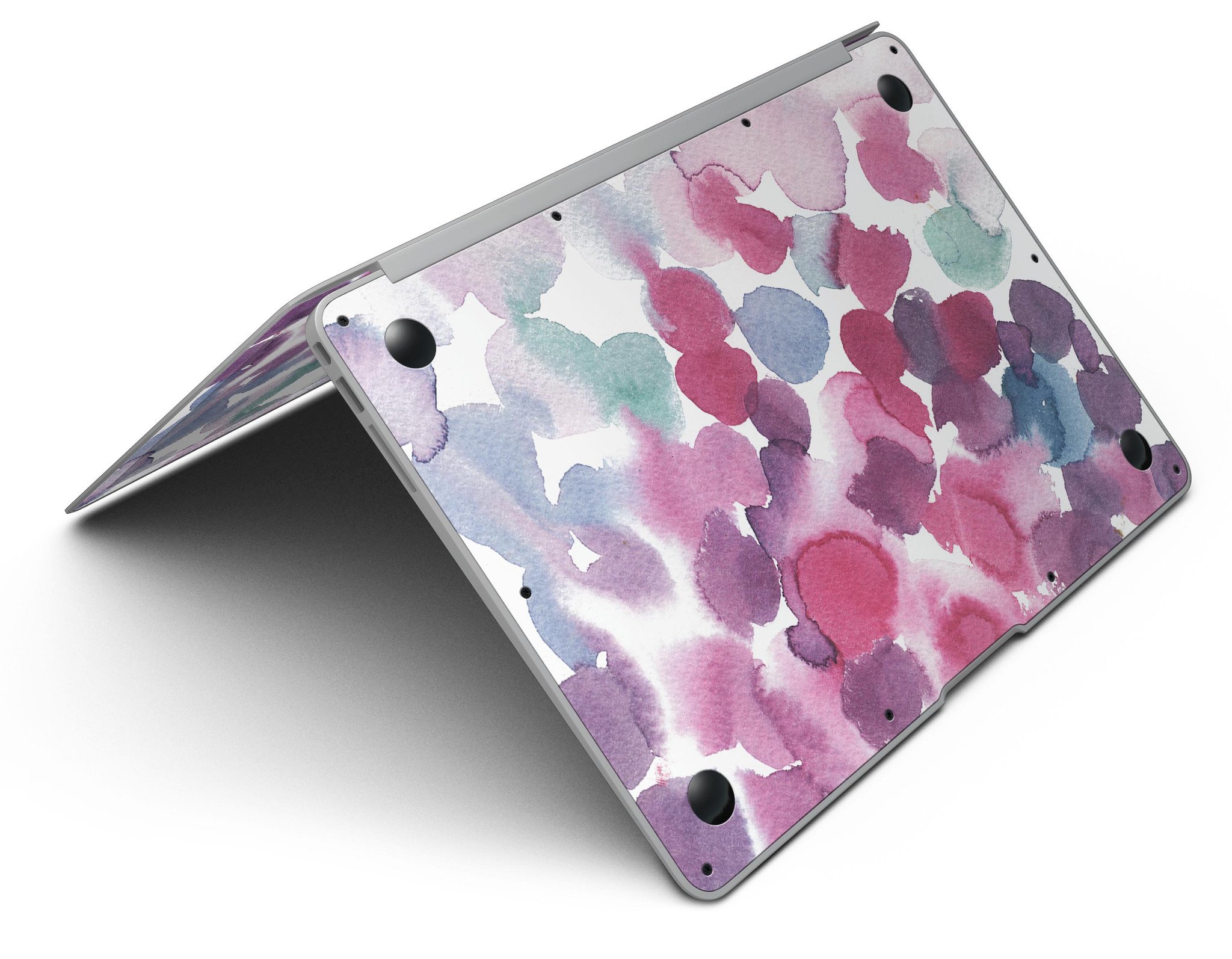 Blot 4 Absorbed Watercolor Texture skin applied to a MacBook Air, showcasing vibrant colors and a sleek design.