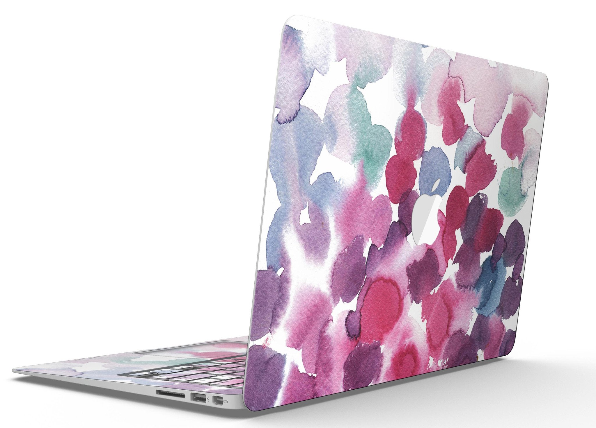 Blot 4 Absorbed Watercolor Texture skin applied to a MacBook Air, showcasing vibrant colors and a sleek design.