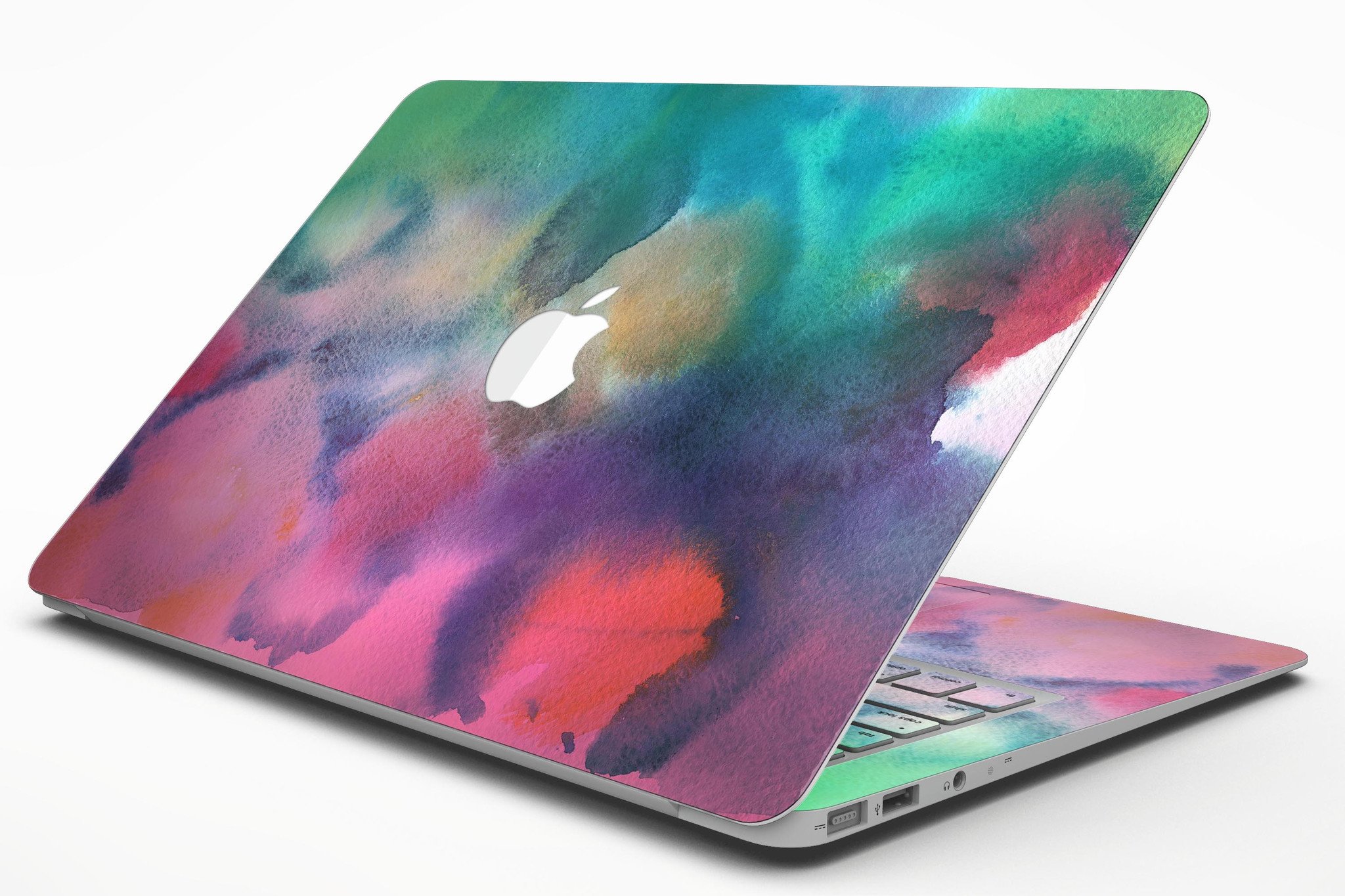 Blotted 534 Absorbed Watercolor Texture skin applied to a MacBook Air, showcasing vibrant colors and a sleek design.