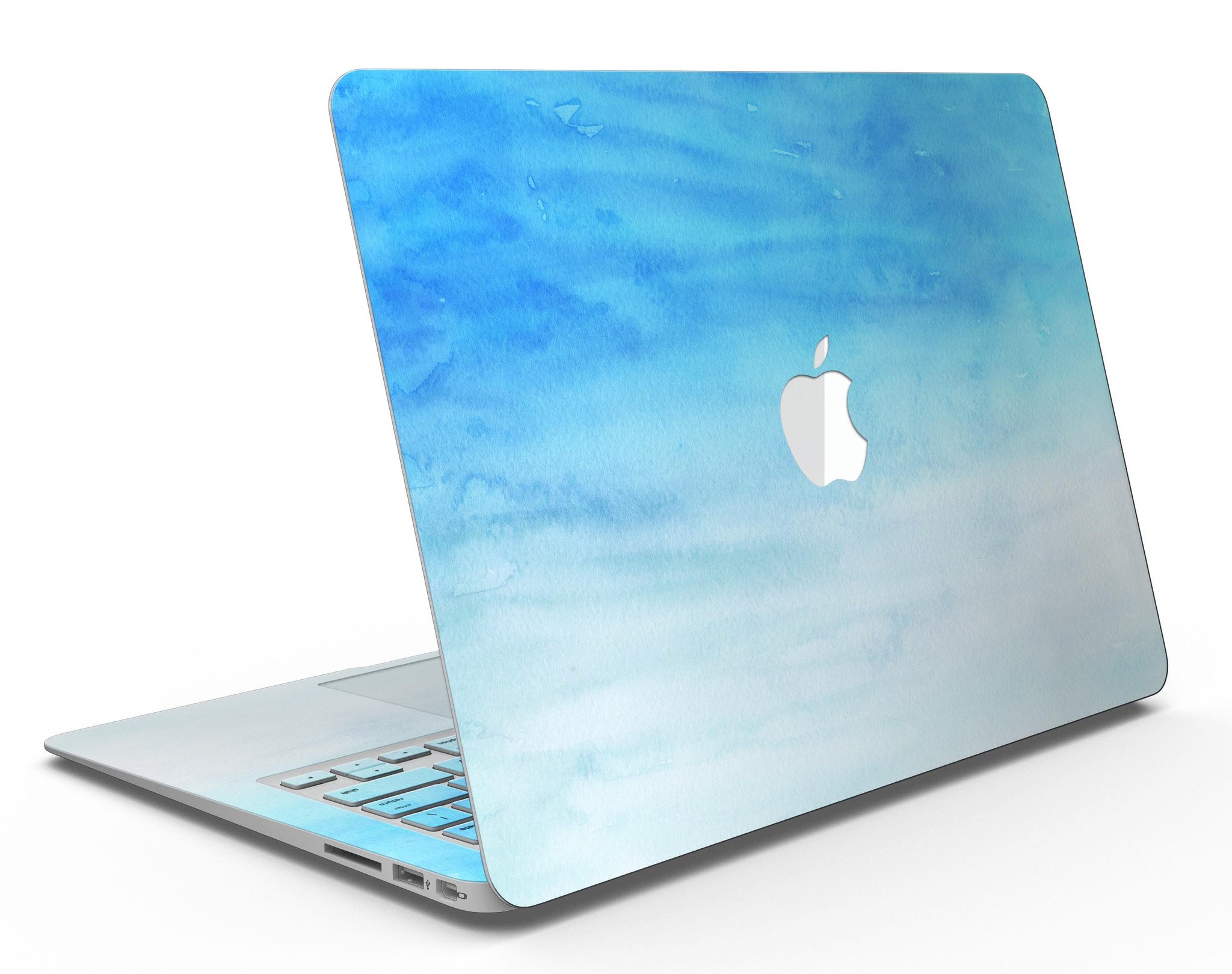 Blotted Blues Absorbed Watercolor Texture MacBook Air Skin Kit showcasing vibrant watercolor design on a sleek MacBook Air.
