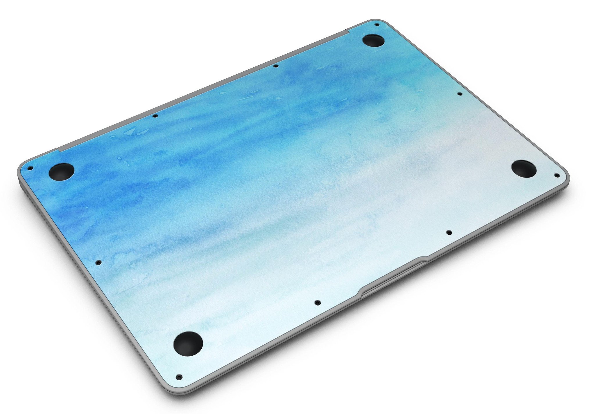 Blotted Blues Absorbed Watercolor Texture MacBook Air Skin Kit showcasing vibrant watercolor design on a sleek MacBook Air.