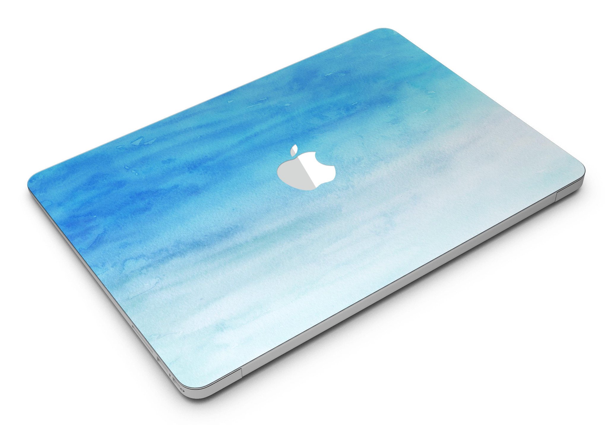 Blotted Blues Absorbed Watercolor Texture MacBook Air Skin Kit showcasing vibrant watercolor design on a sleek MacBook Air.