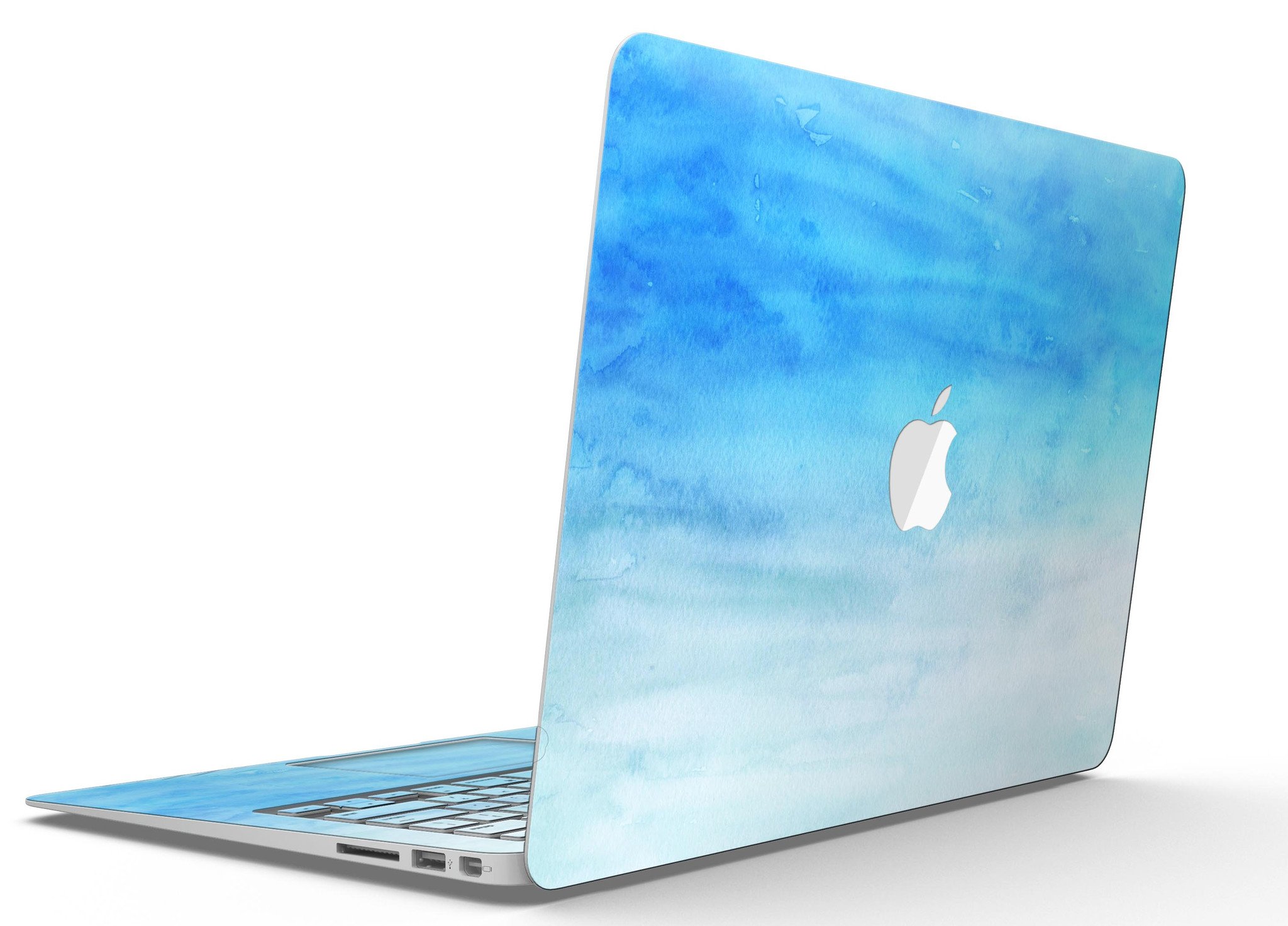 Blotted Blues Absorbed Watercolor Texture MacBook Air Skin Kit showcasing vibrant watercolor design on a sleek MacBook Air.