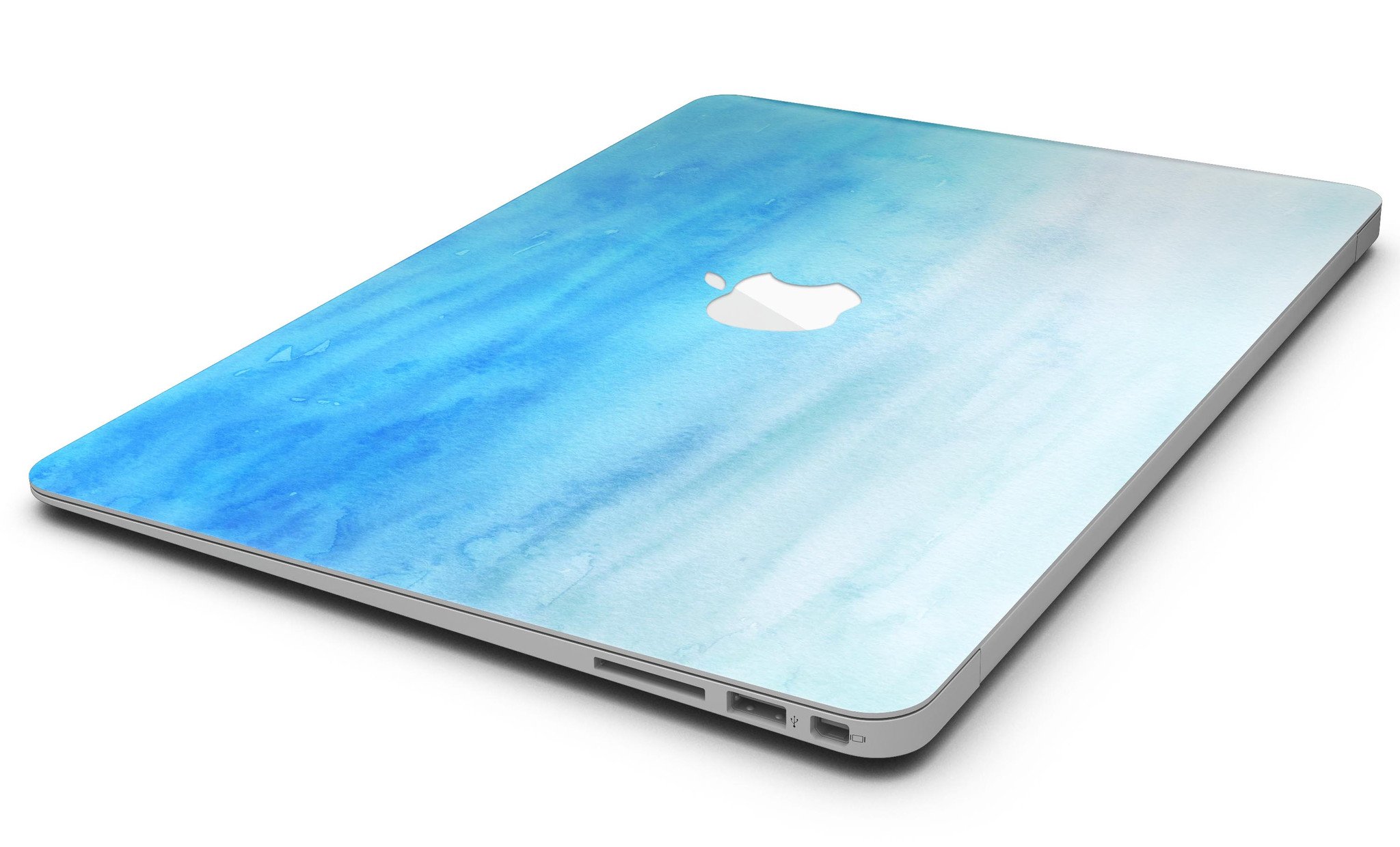 Blotted Blues Absorbed Watercolor Texture MacBook Air Skin Kit showcasing vibrant watercolor design on a sleek MacBook Air.