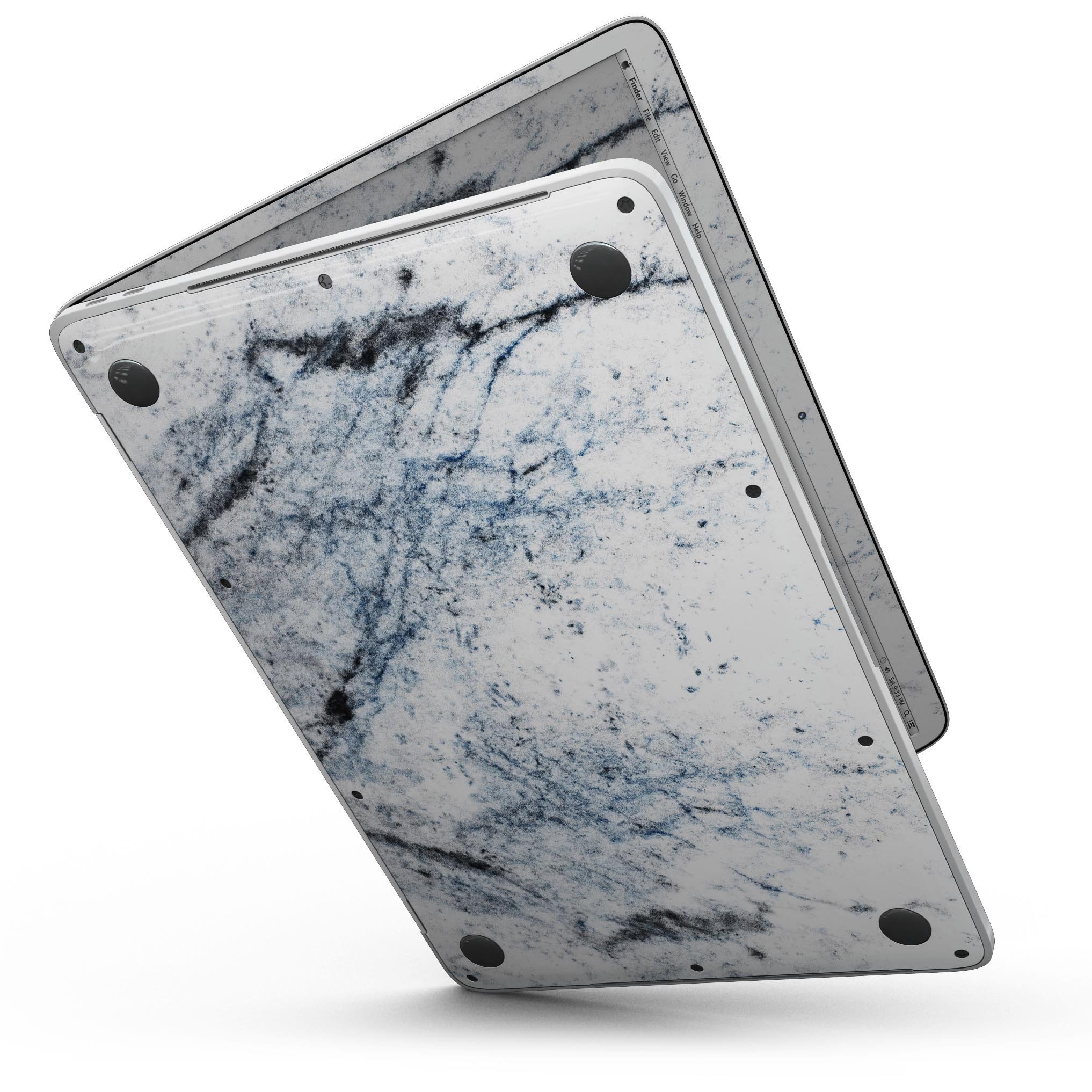 Blue and Black Grunge skin for 13" MacBook Pro on a white marble surface, showcasing its stylish design and premium quality.