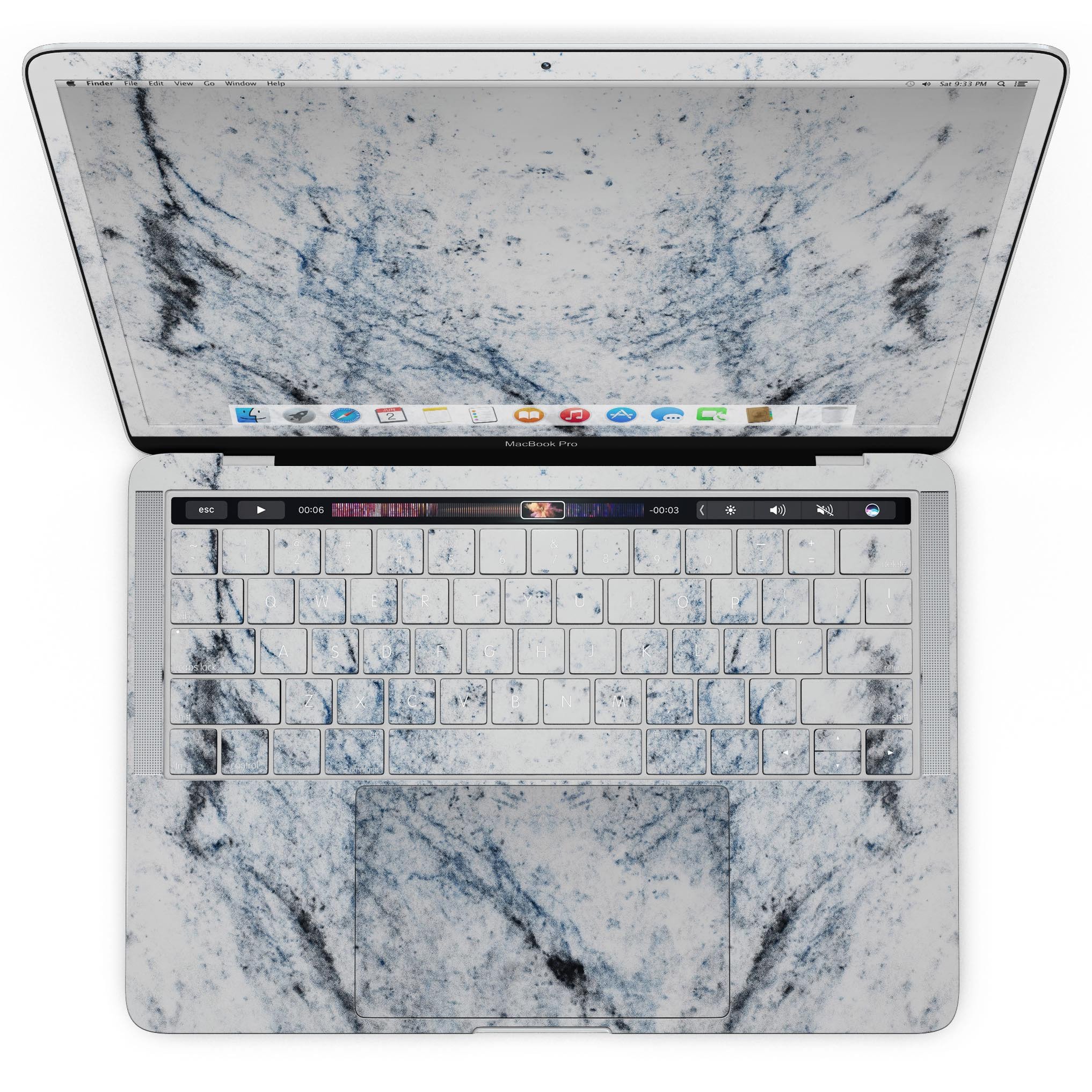 Blue and Black Grunge skin for MacBook Pro on a white marble surface, showcasing a stylish design that protects the device.