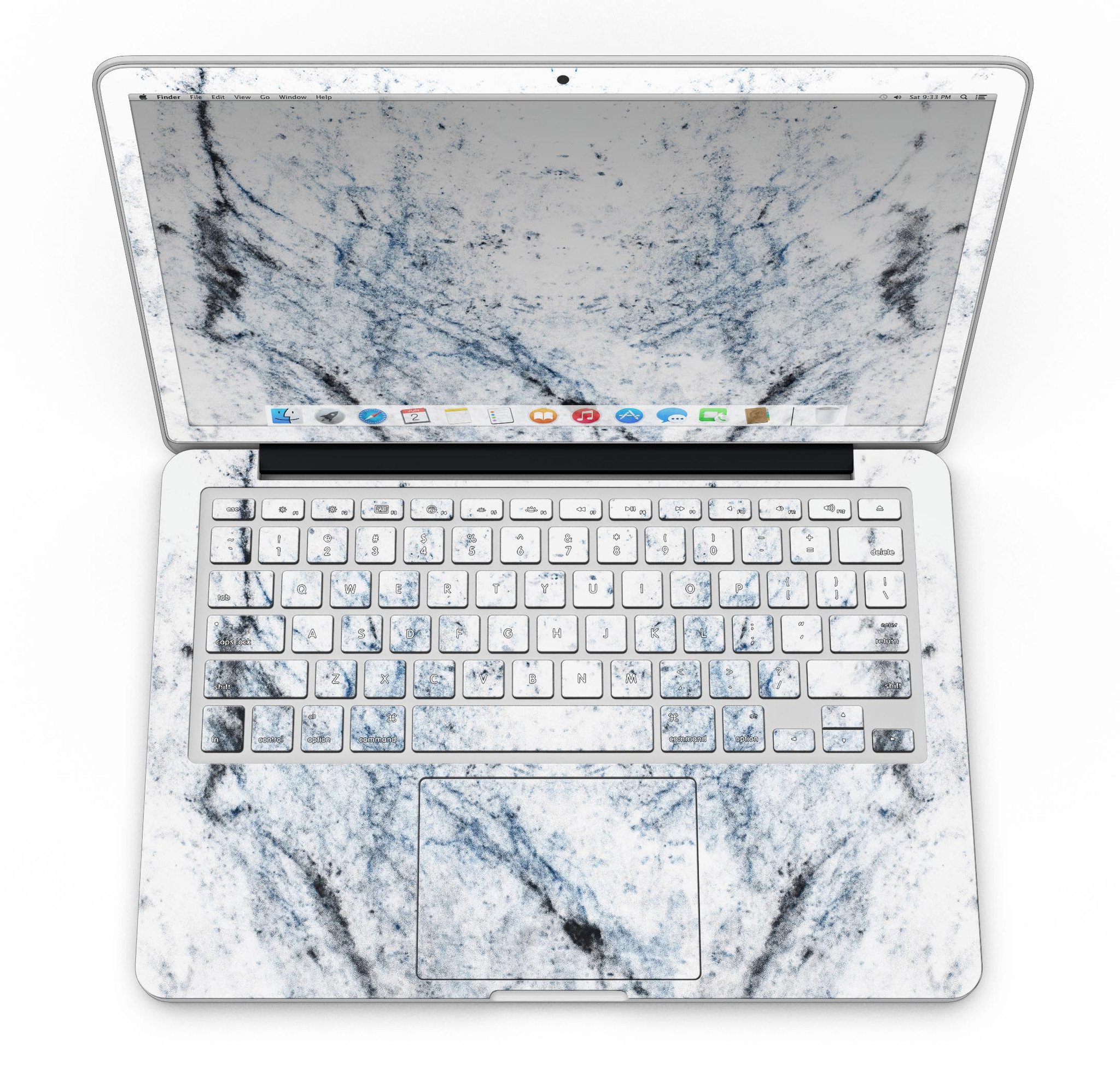 Blue and black grunge vinyl skin on a MacBook Pro with Retina Display, showcasing a stylish design over a white marble surface.