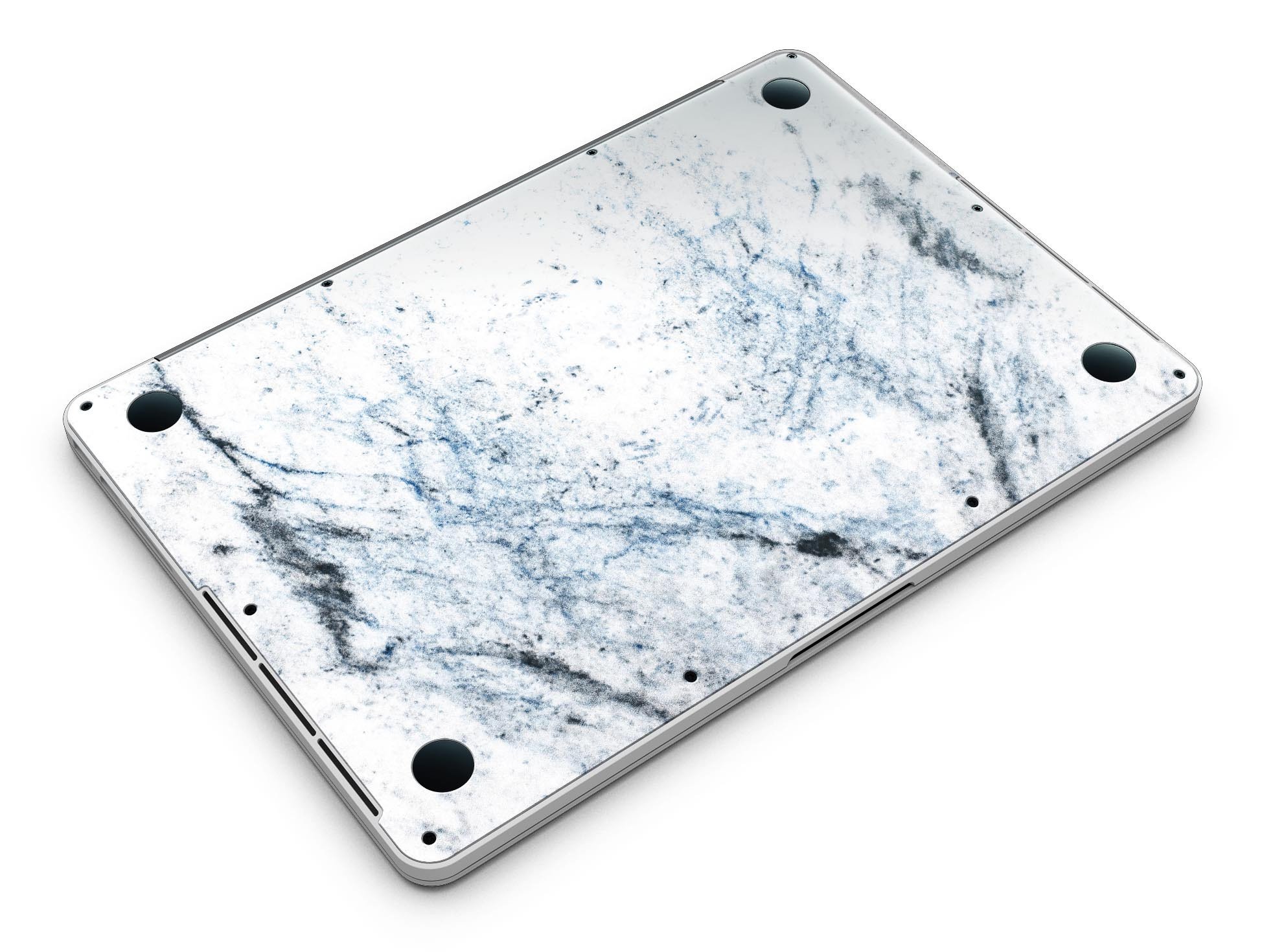 Blue and black grunge vinyl skin on a MacBook Pro with Retina Display, showcasing a stylish design over a white marble surface.