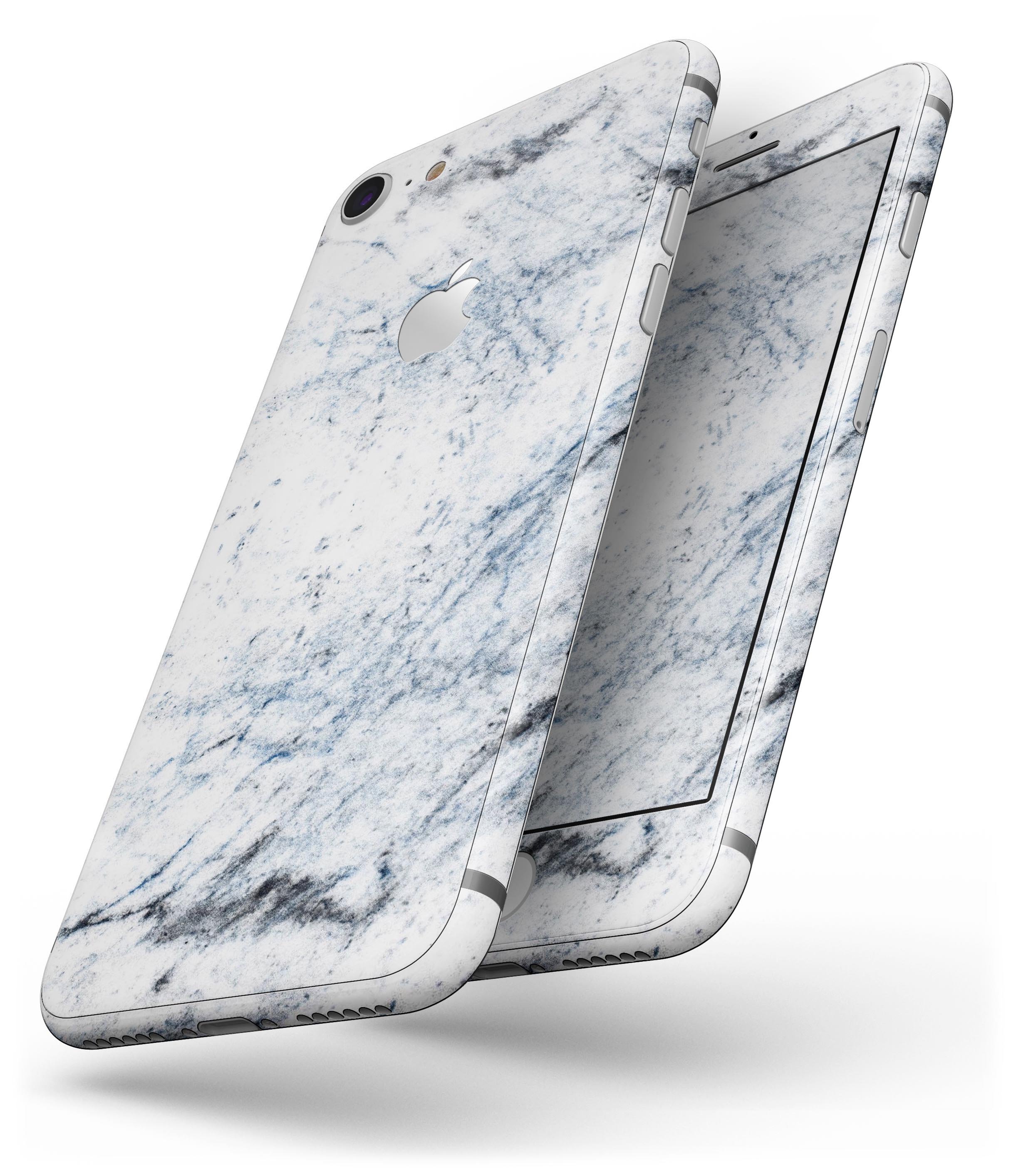 Blue and Black Grunge Skin-kit for iPhone 8 and 8 Plus on a white marble surface, showcasing its stylish design.