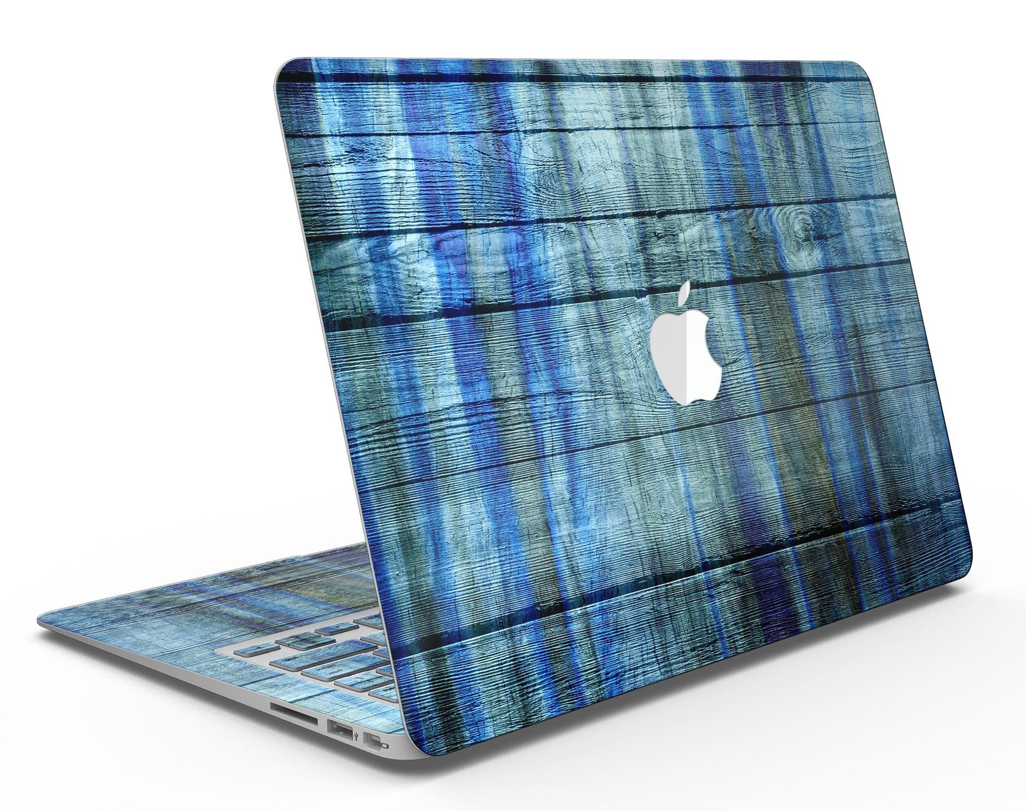 Blue and green tye-dyed vinyl skin for MacBook Air, showcasing vibrant colors and a sleek design.