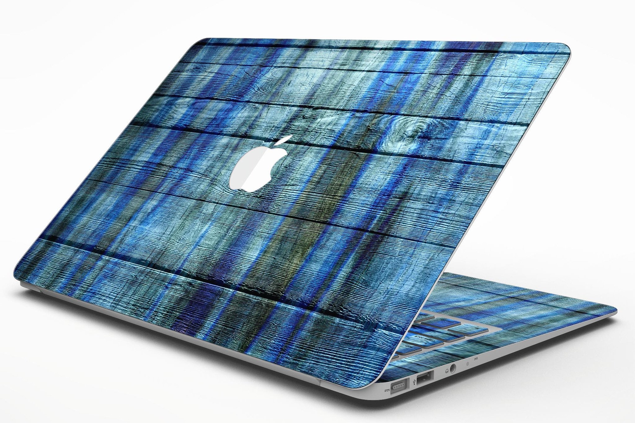 Blue and green tye-dyed vinyl skin for MacBook Air, showcasing vibrant colors and a sleek design.
