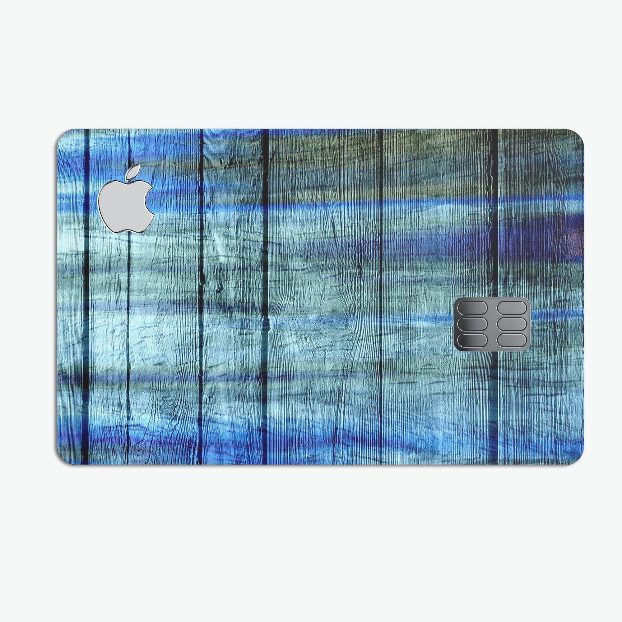 Blue and Green Tye-Dyed Wood decal skin for Apple Card, showcasing vibrant colors and a protective design.