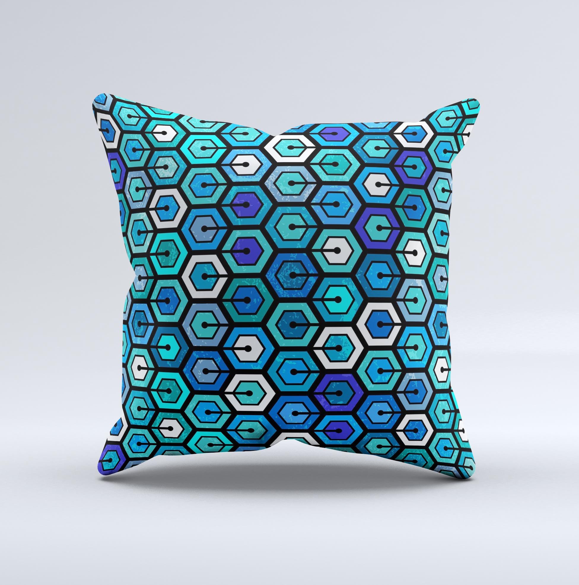 A vibrant decorative throw pillow featuring a unique hexagon pattern in blue and green colors, handcrafted in Virginia.