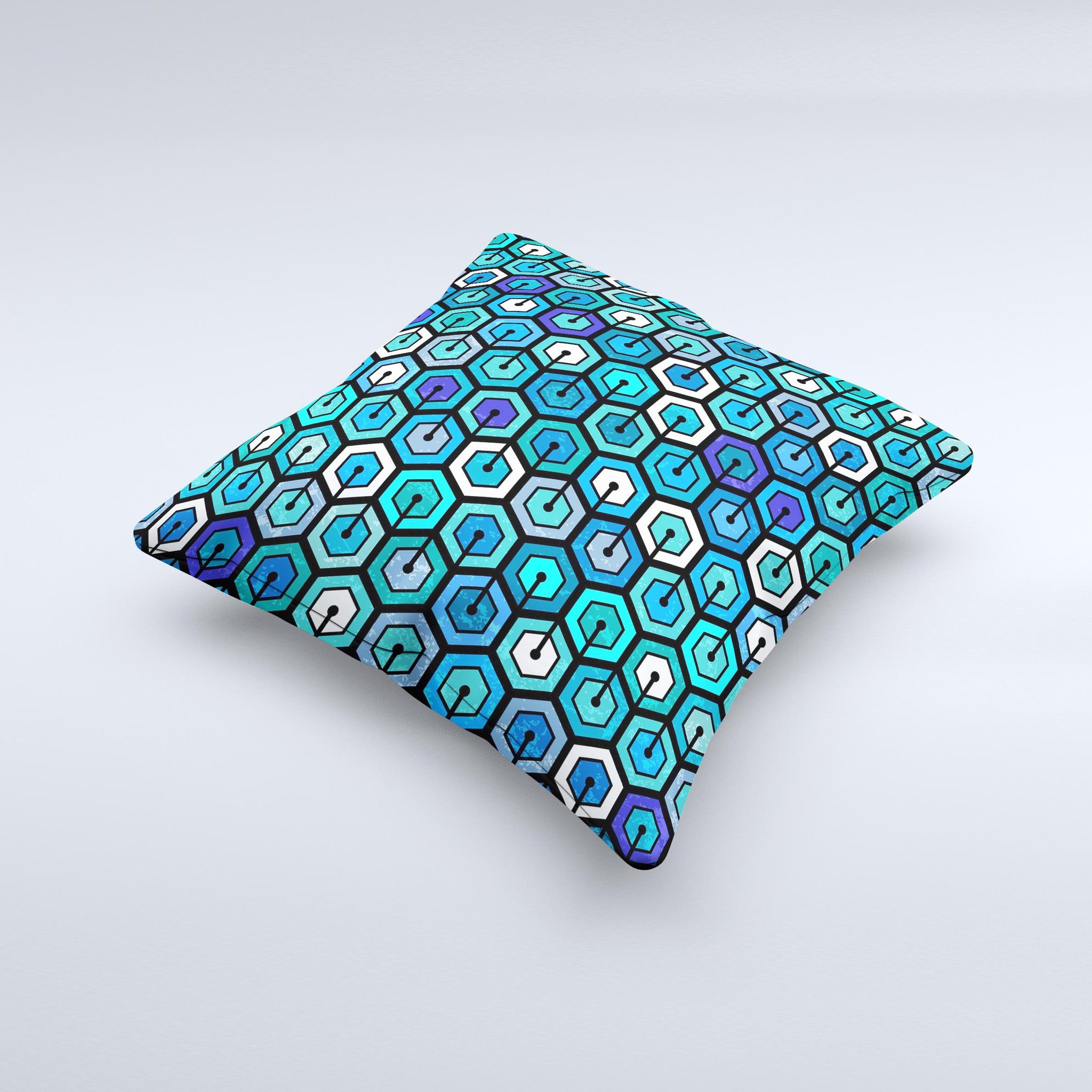 A vibrant decorative throw pillow featuring a unique hexagon pattern in blue and green colors, handcrafted in Virginia.