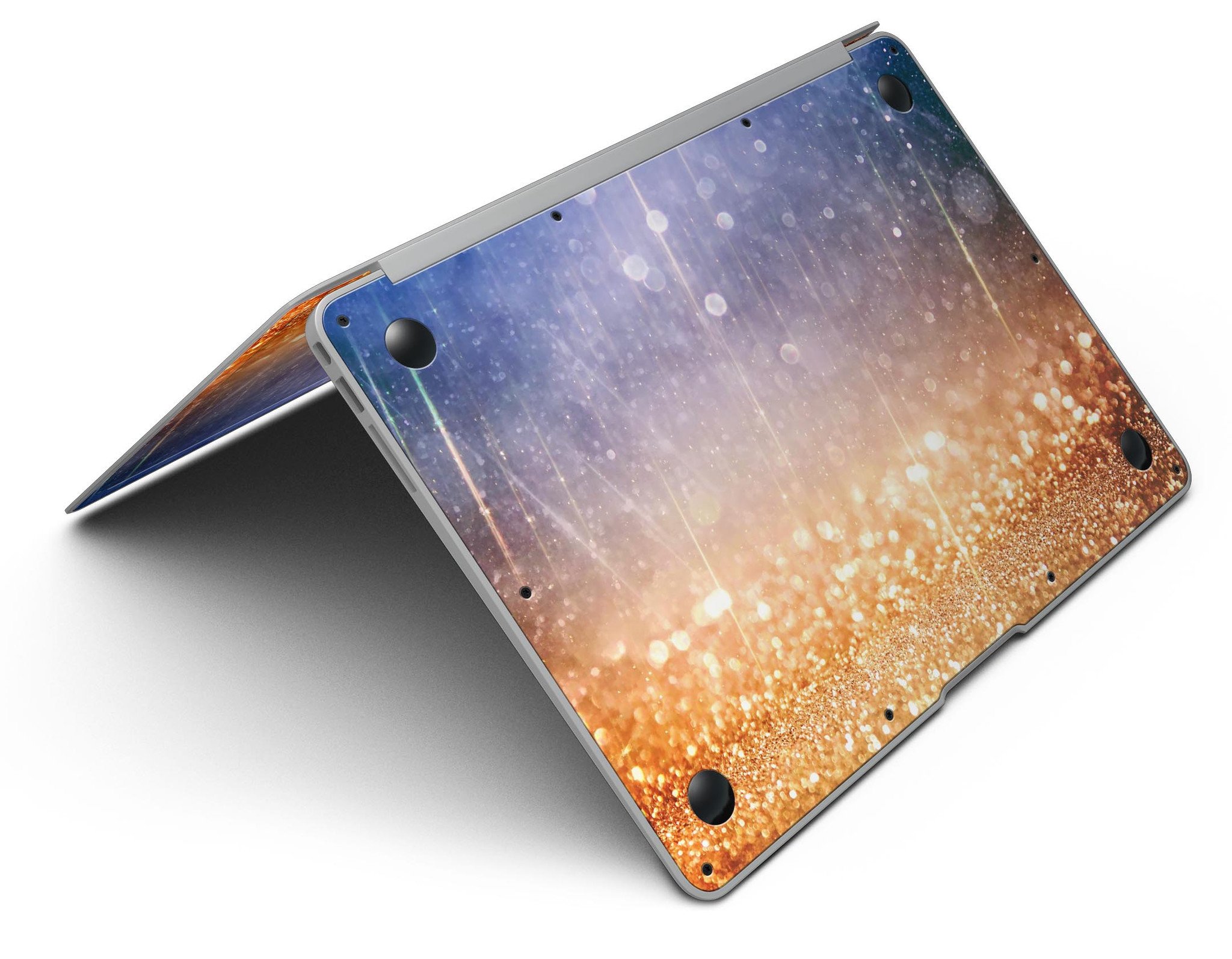 Blue and orange scratched surface MacBook Air skin with glowing gold accents, showcasing a stylish design.