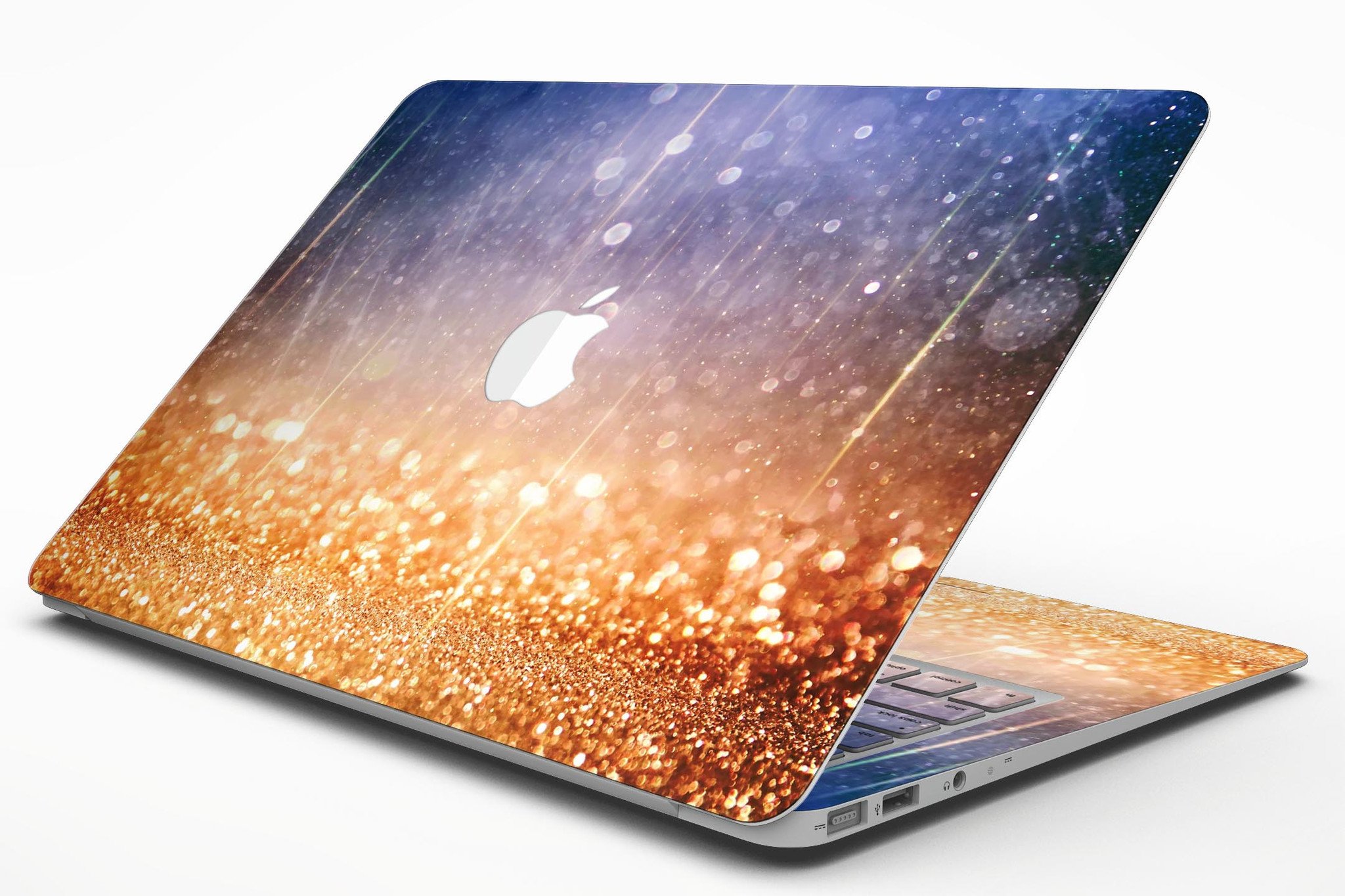 Blue and orange scratched surface MacBook Air skin with glowing gold accents, showcasing a stylish design.