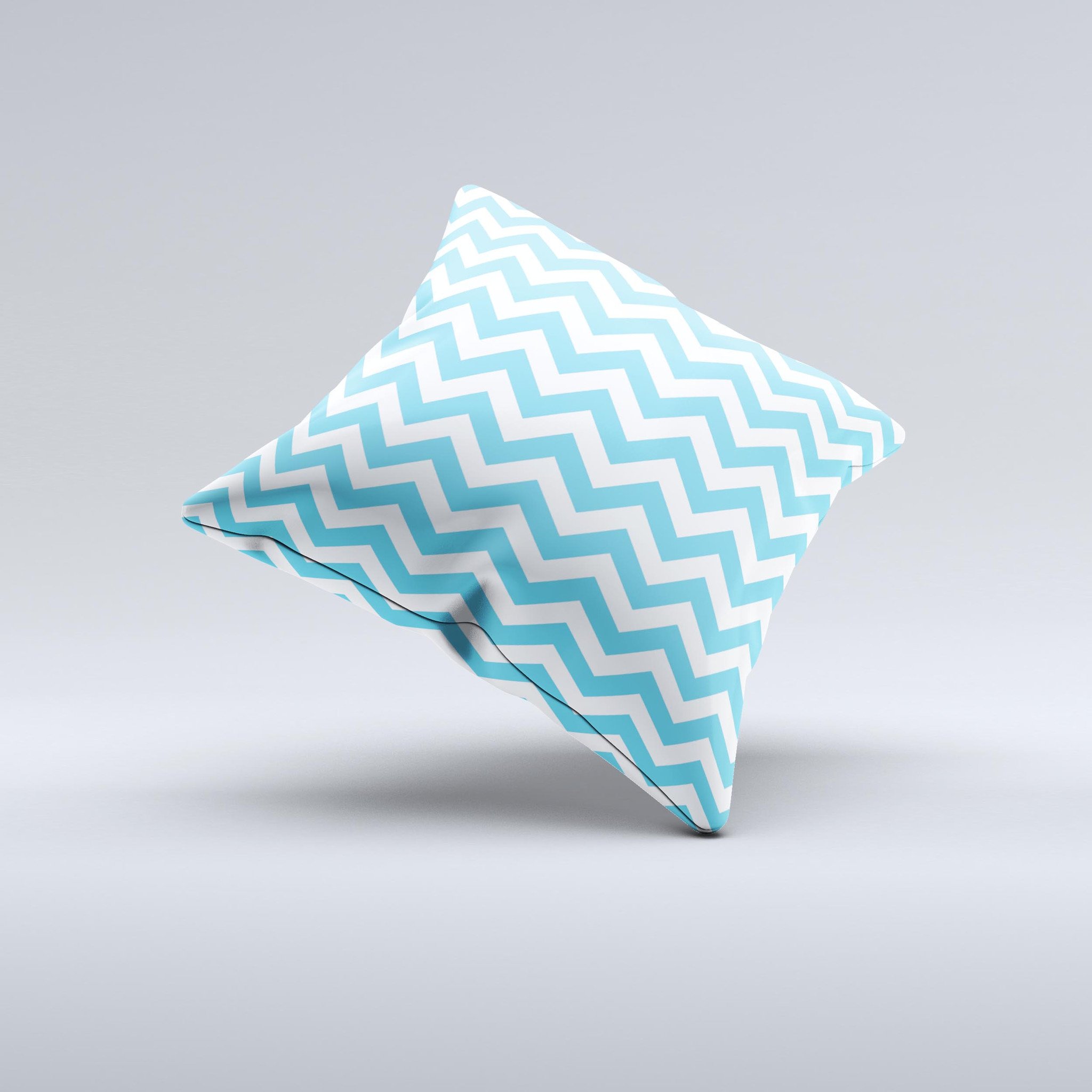 Blue and white decorative throw pillow featuring a chevron pattern, handcrafted in Virginia with high-quality materials.