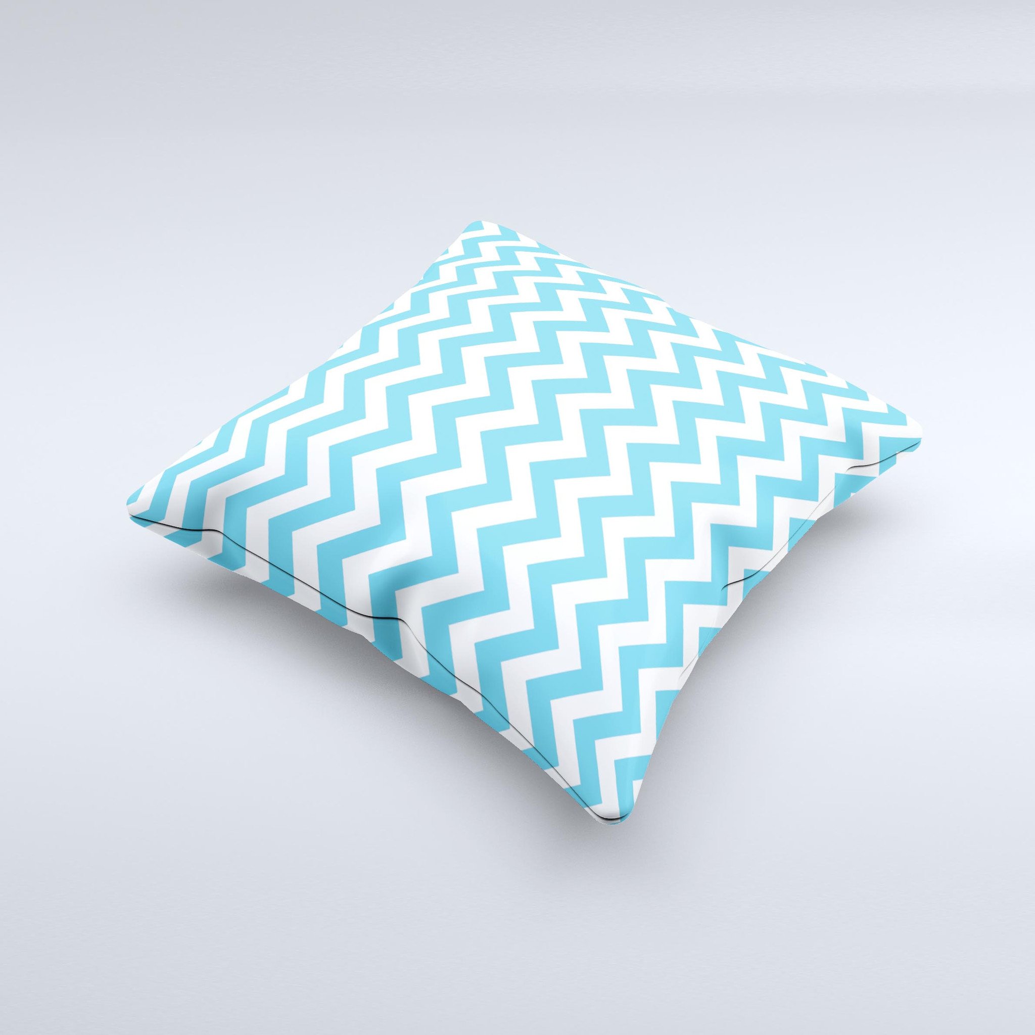 Blue and white decorative throw pillow featuring a chevron pattern, handcrafted in Virginia with high-quality materials.
