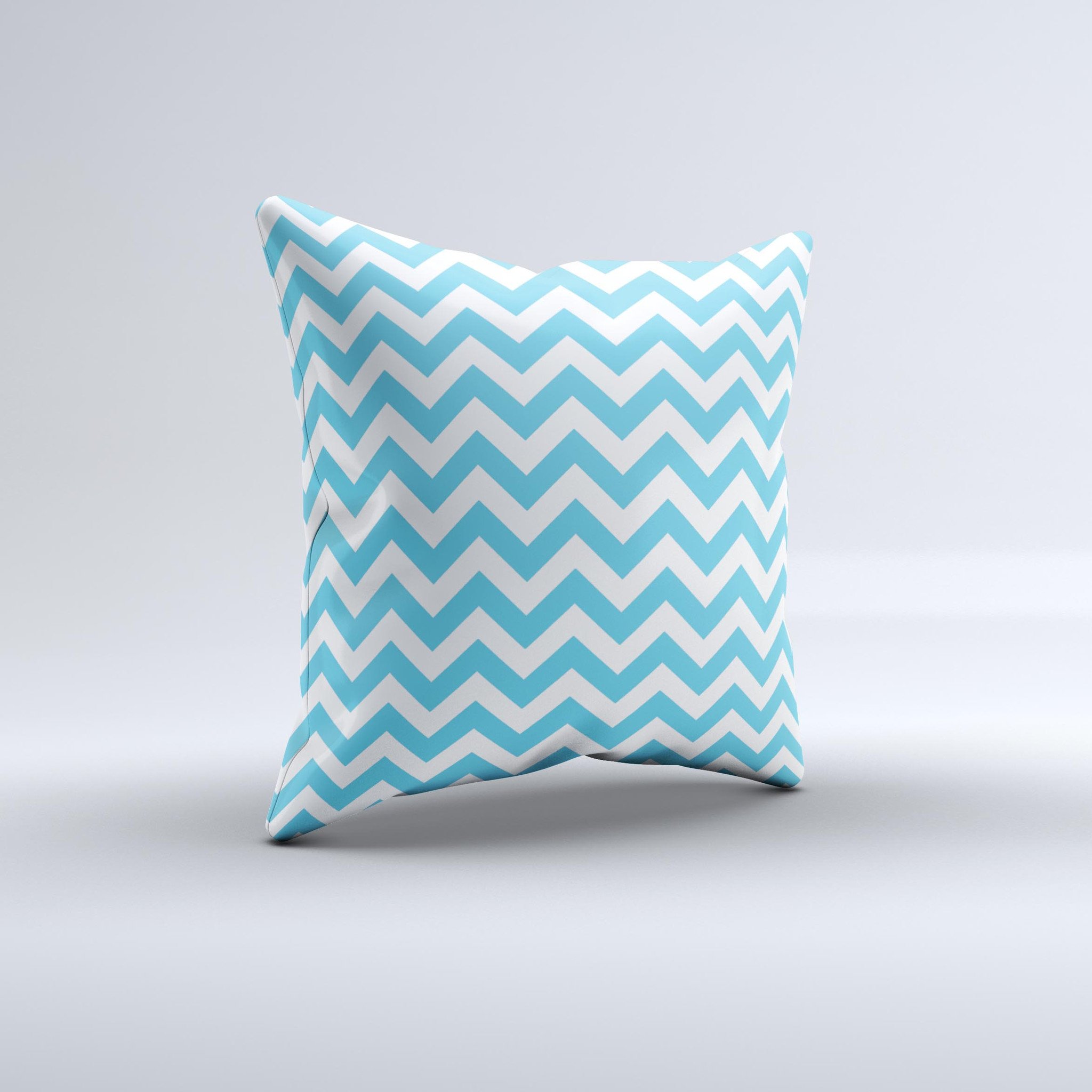 Blue and white decorative throw pillow featuring a chevron pattern, handcrafted in Virginia with high-quality materials.