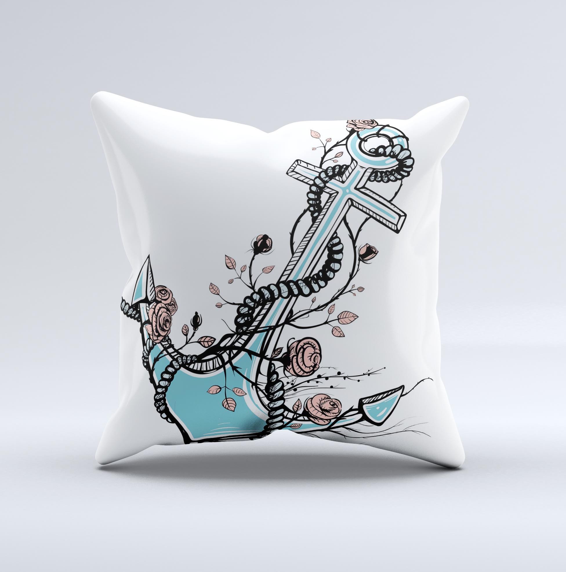Blue pastel decorative throw pillow featuring an anchor design surrounded by roses, showcasing a unique handmade quality.