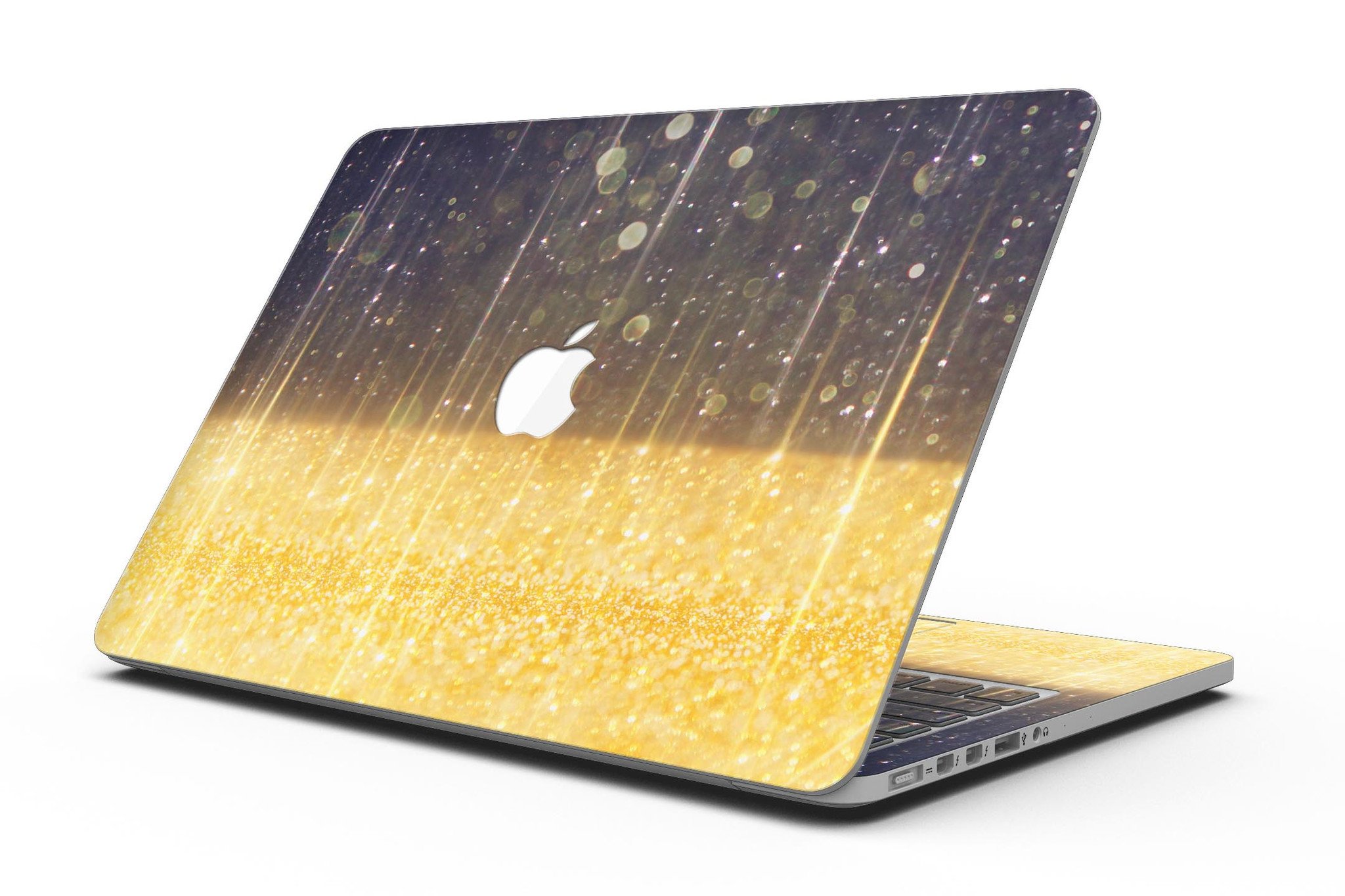 A MacBook Pro with a blue streaked skin featuring unfocused gold sparkles, showcasing a stylish and protective design.