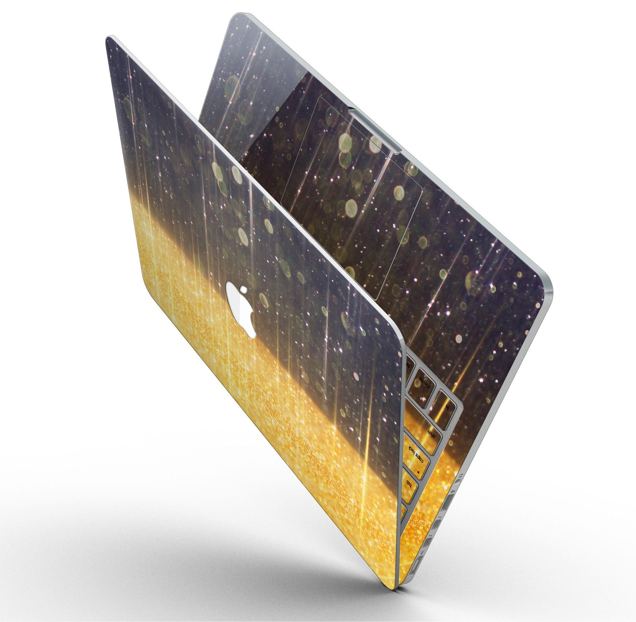 A MacBook Pro with a blue streaked skin featuring unfocused gold sparkles, showcasing a stylish and protective design.
