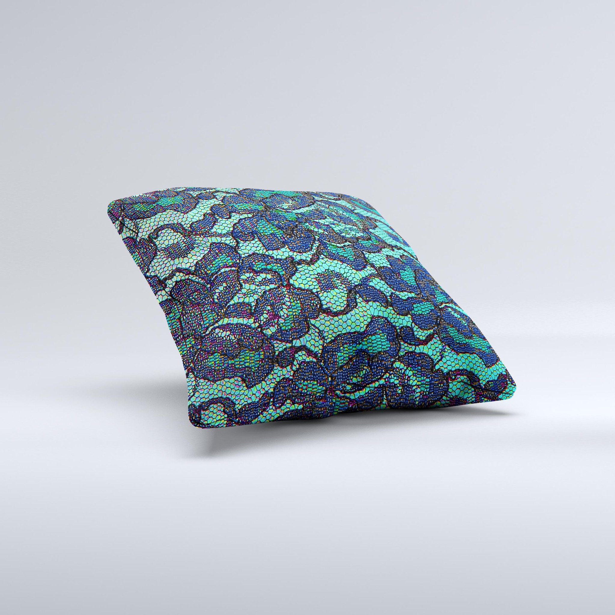 Blue and teal decorative throw pillow with lace texture, handcrafted in Virginia, showcasing unique design and high-quality materials.