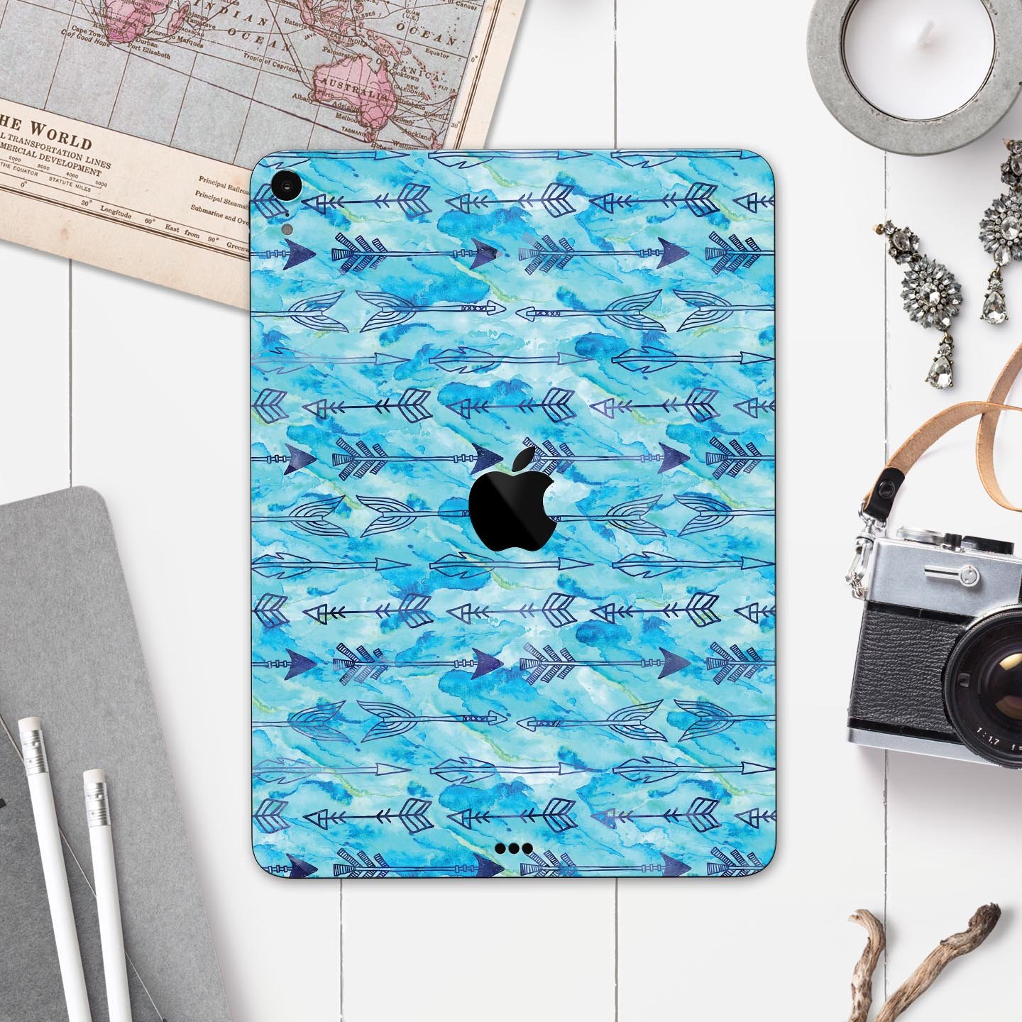 Blue Tribal Arrow Pattern skin decal for Apple iPad, showcasing intricate tribal designs on a full-body protective skin.