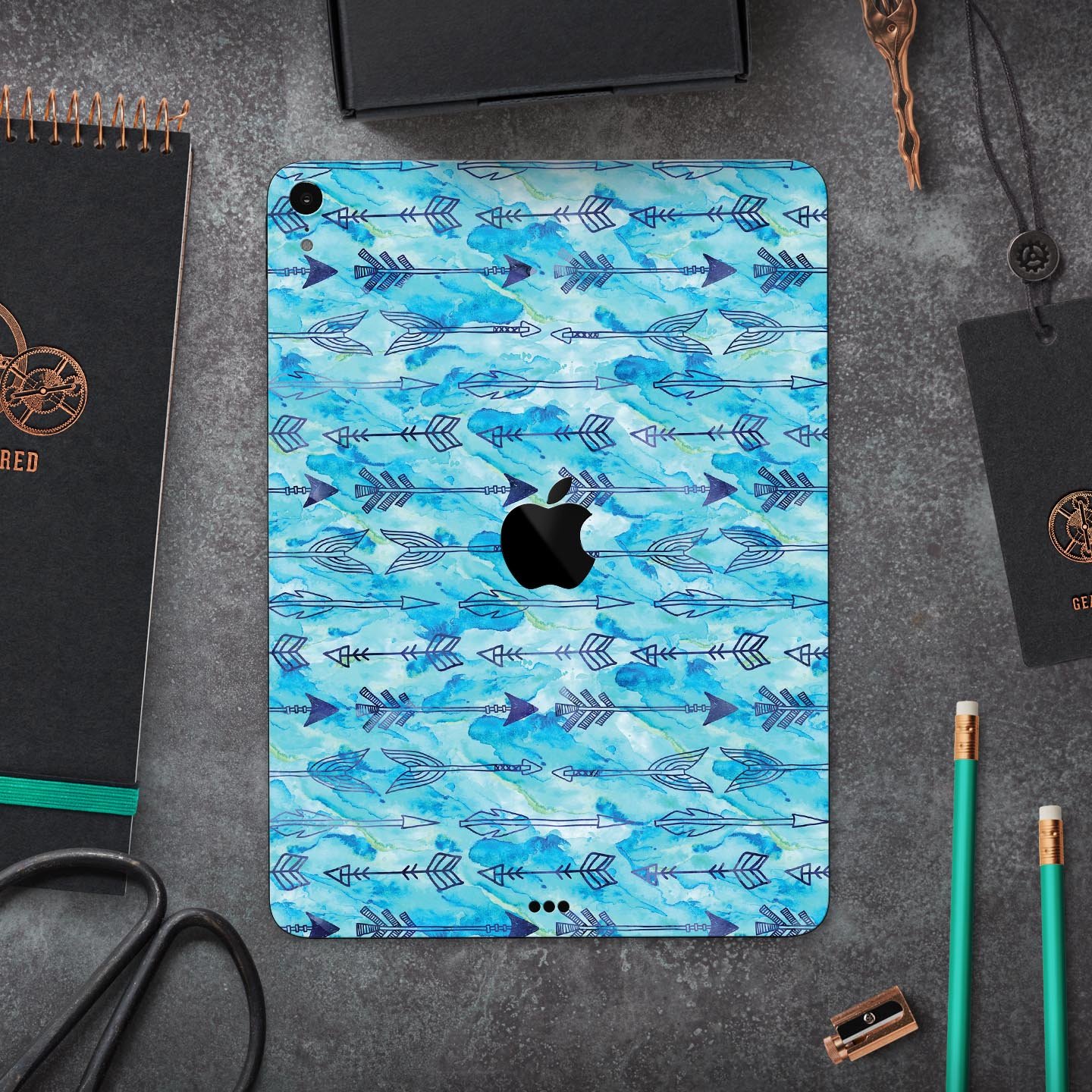 Blue Tribal Arrow Pattern skin decal for Apple iPad, showcasing intricate tribal designs on a full-body protective skin.