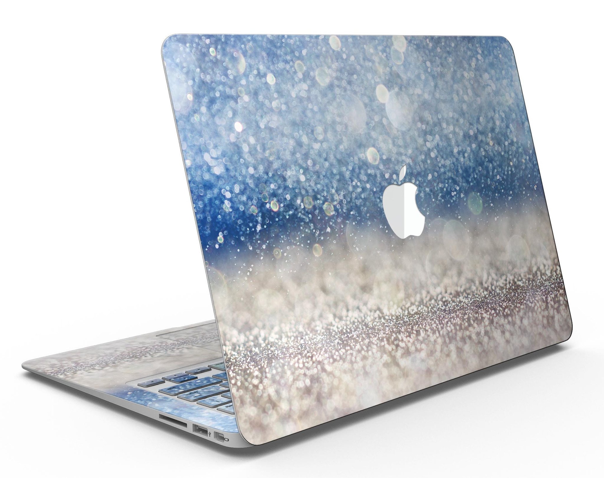 Blue Unfocused Silver Sparkle MacBook Air skin kit showcasing a vibrant design with a glossy finish.