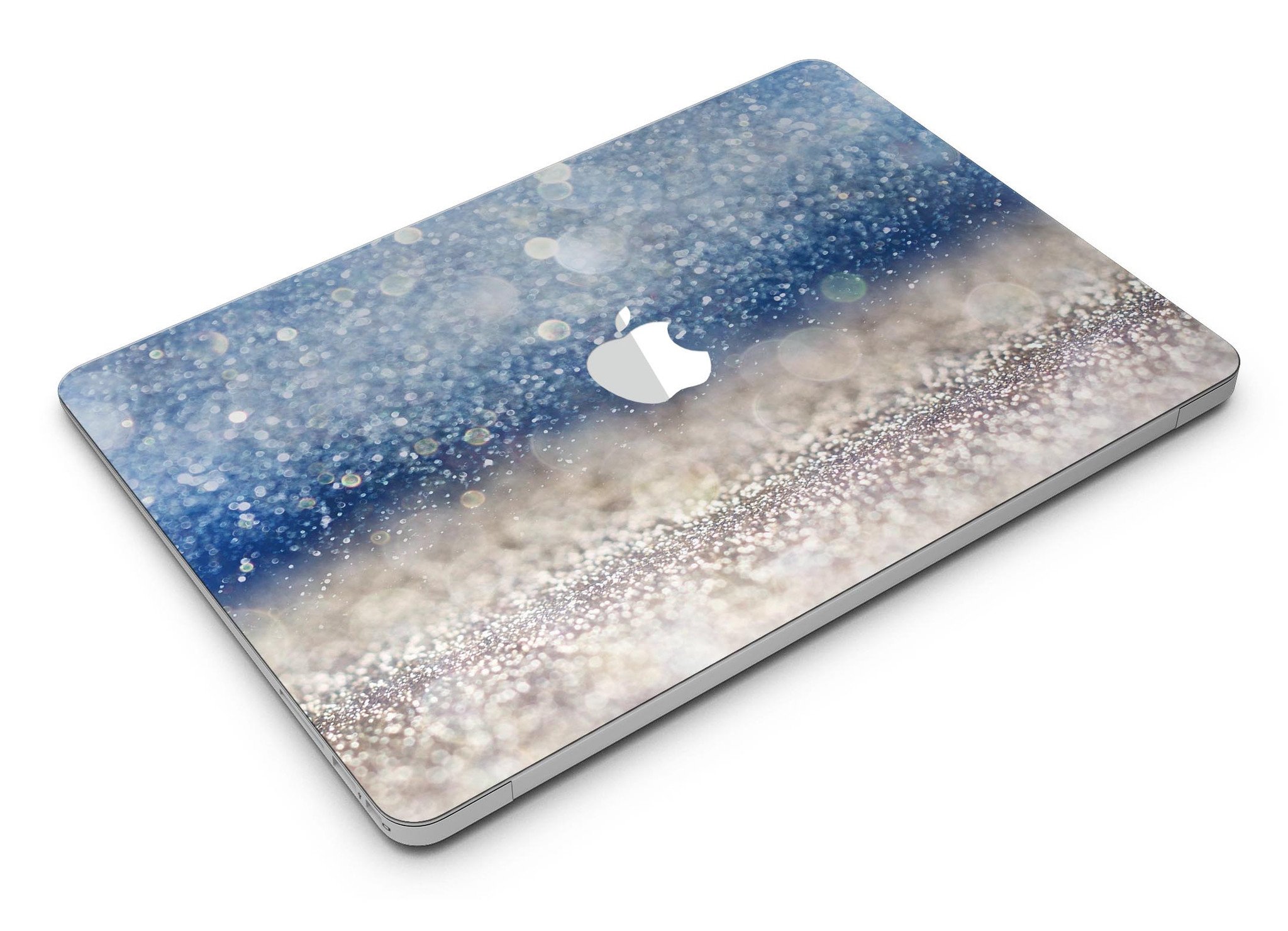 Blue Unfocused Silver Sparkle MacBook Air skin kit showcasing a vibrant design with a glossy finish.