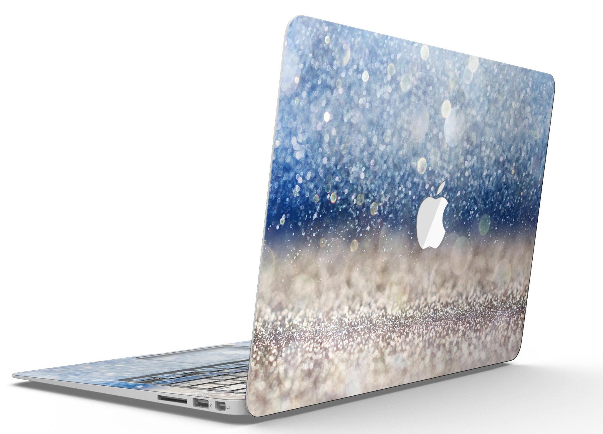 Blue Unfocused Silver Sparkle MacBook Air skin kit showcasing a vibrant design with a glossy finish.