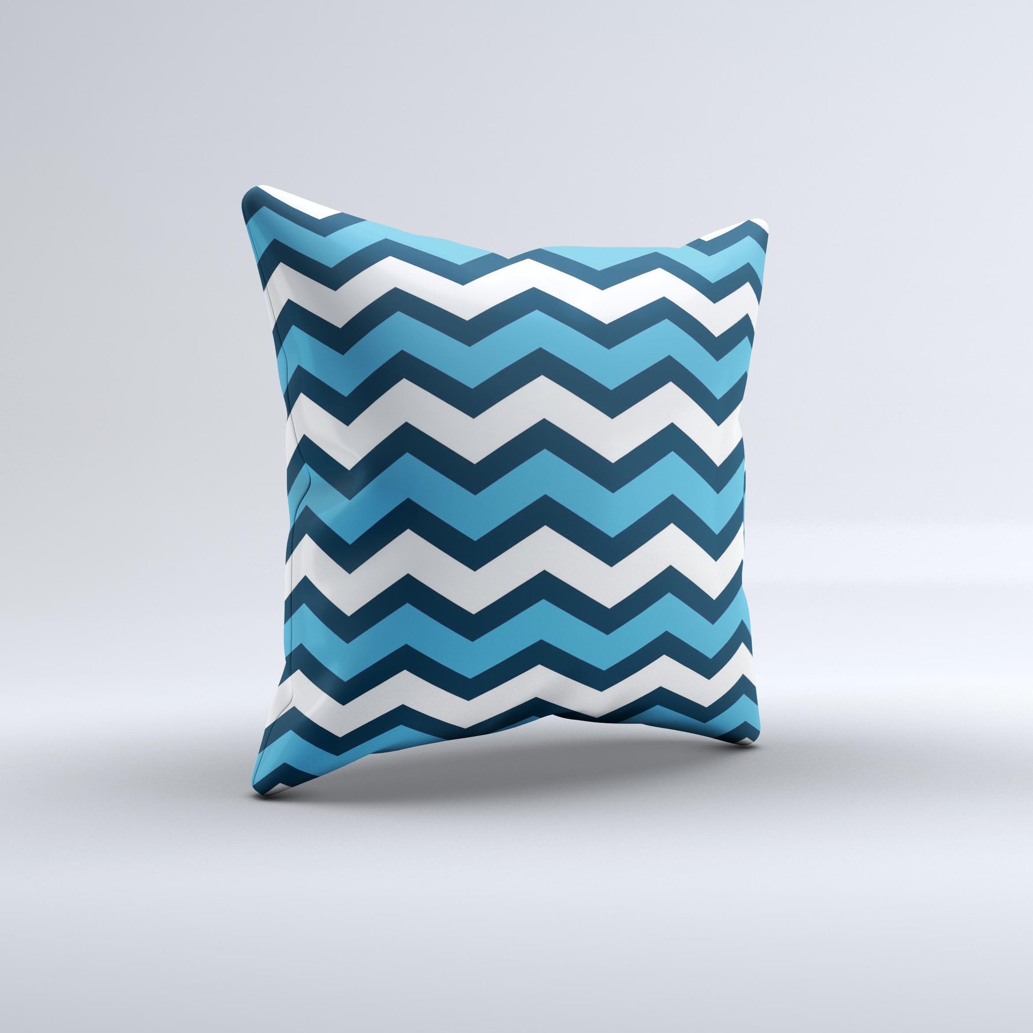 Blue decorative throw pillow featuring a wide chevron pattern, handmade in Virginia with high-quality materials.