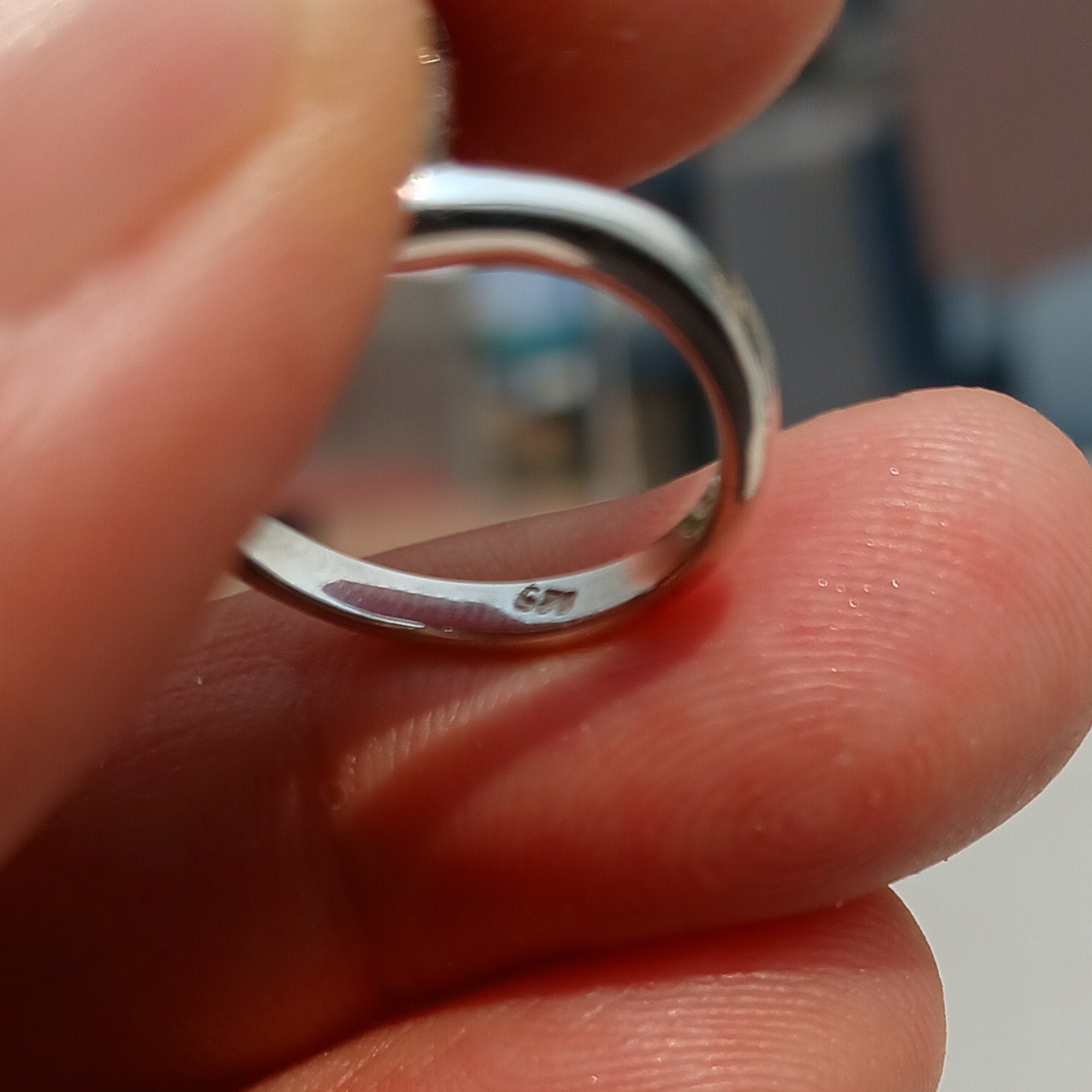 A beautiful Blue Zircon Ring set in polished 925 Sterling Silver, featuring an oval cut blue gemstone, perfect for elegant occasions.