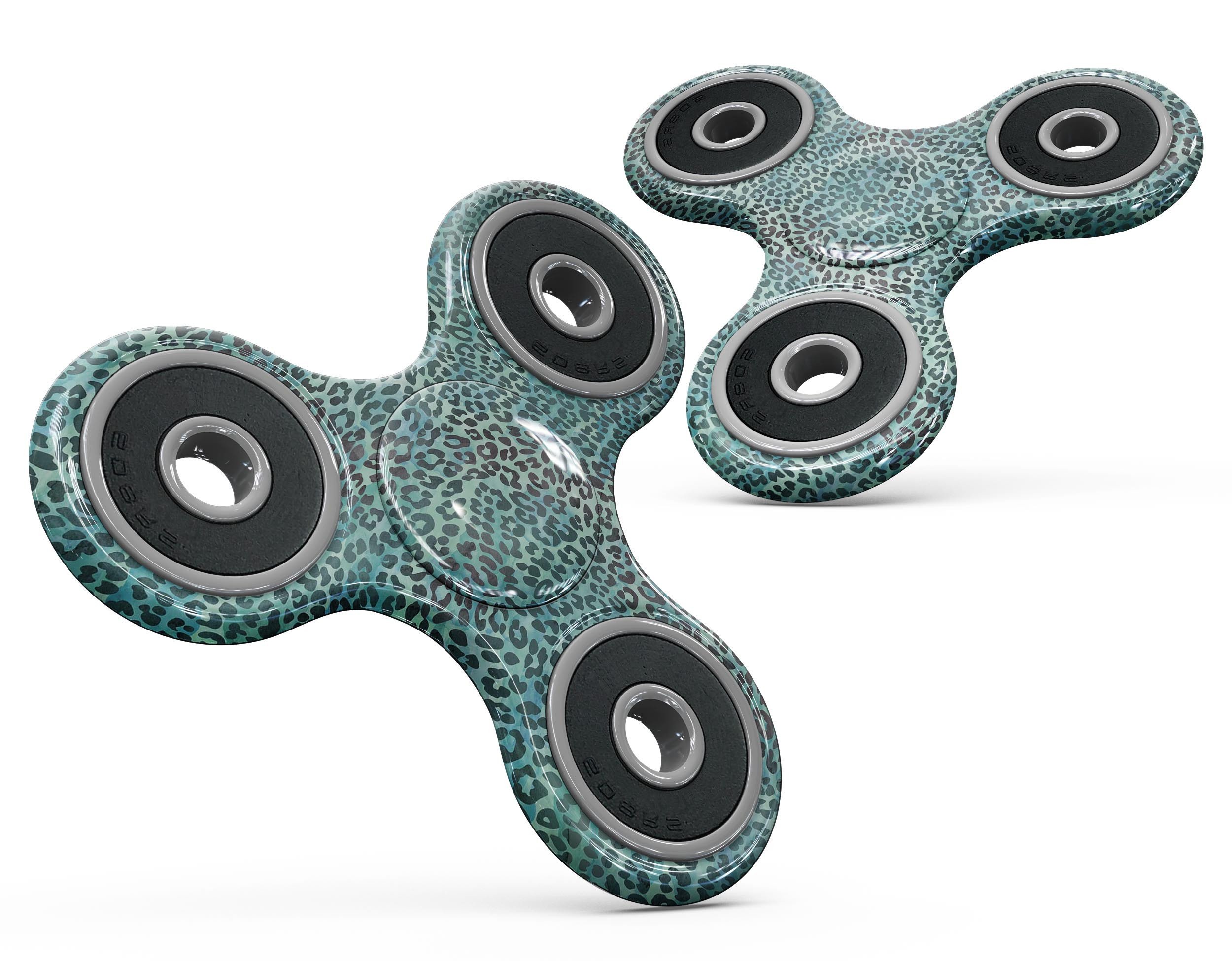 Blue-green watercolor leopard pattern fidget spinner skin, showcasing vibrant colors and a stylish design.
