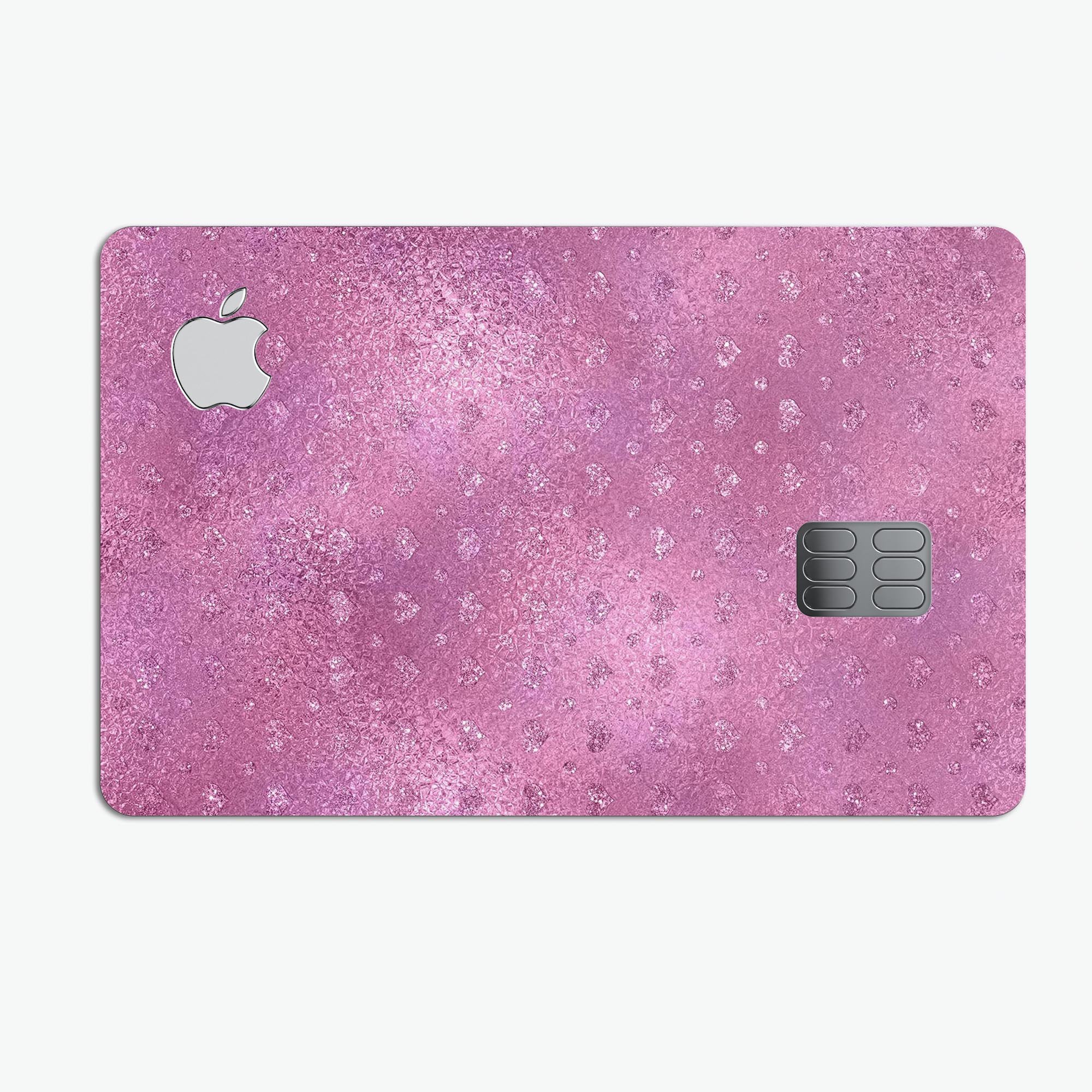 Blushed Pink Premium Protective Decal with Mini Glitter Hearts for Apple Card, showcasing its stylish design and protective features.