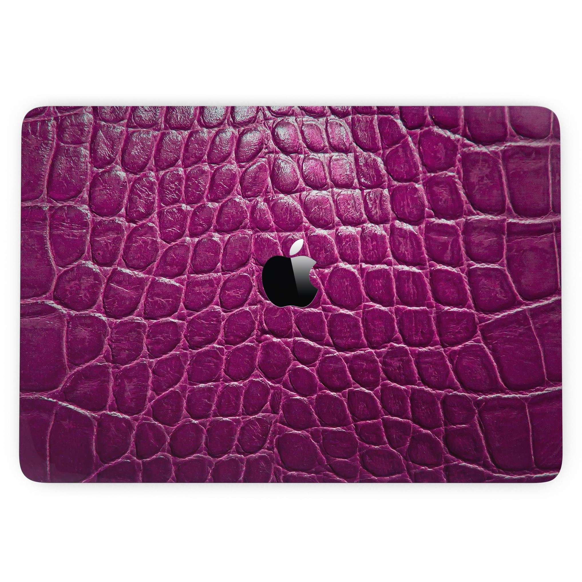 Bright magenta alligator skin MacBook Pro skin kit showcasing vibrant color and texture.