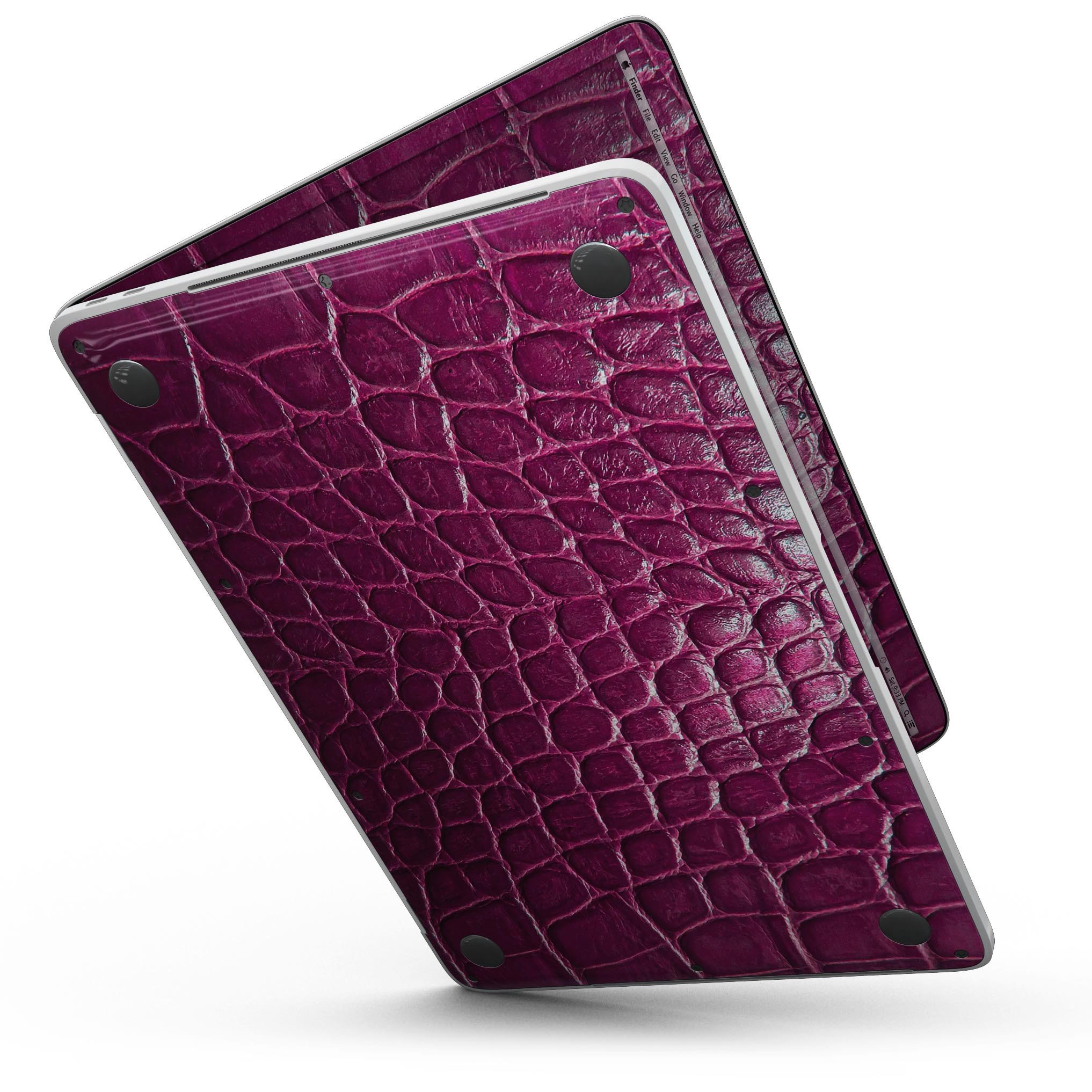 Bright magenta alligator skin MacBook Pro skin kit showcasing vibrant color and texture.