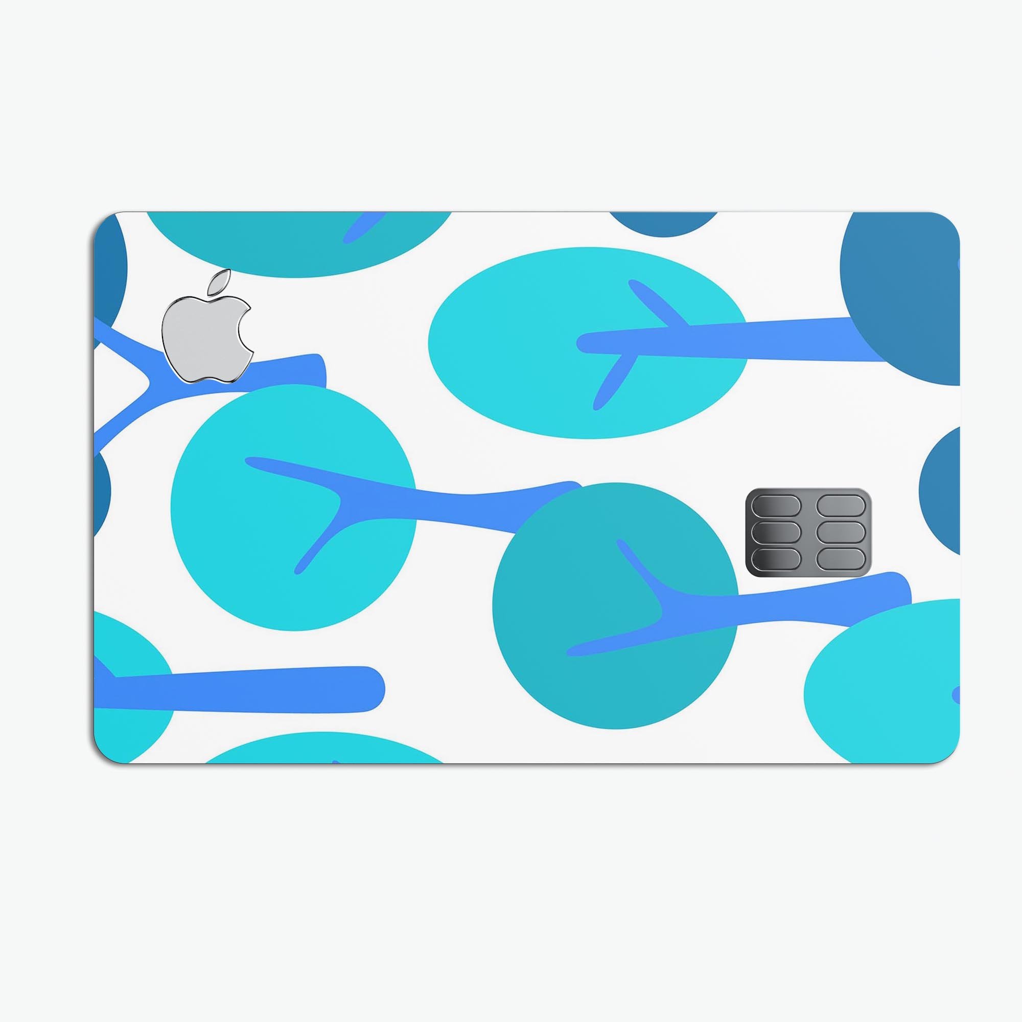 Bright Shades of Blue Cartoon Trees decal for Apple Card, showcasing vibrant colors and a protective design.