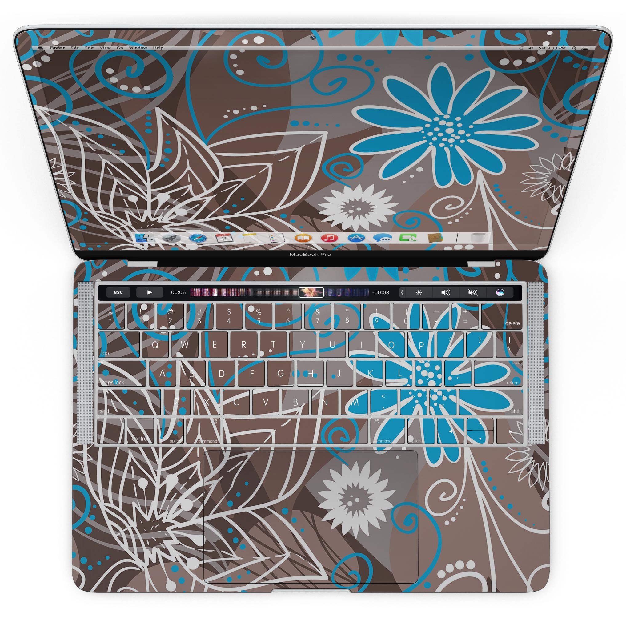 A MacBook Pro covered with a brown surface featuring a whimsical floral pattern in blue and white, showcasing its stylish design.