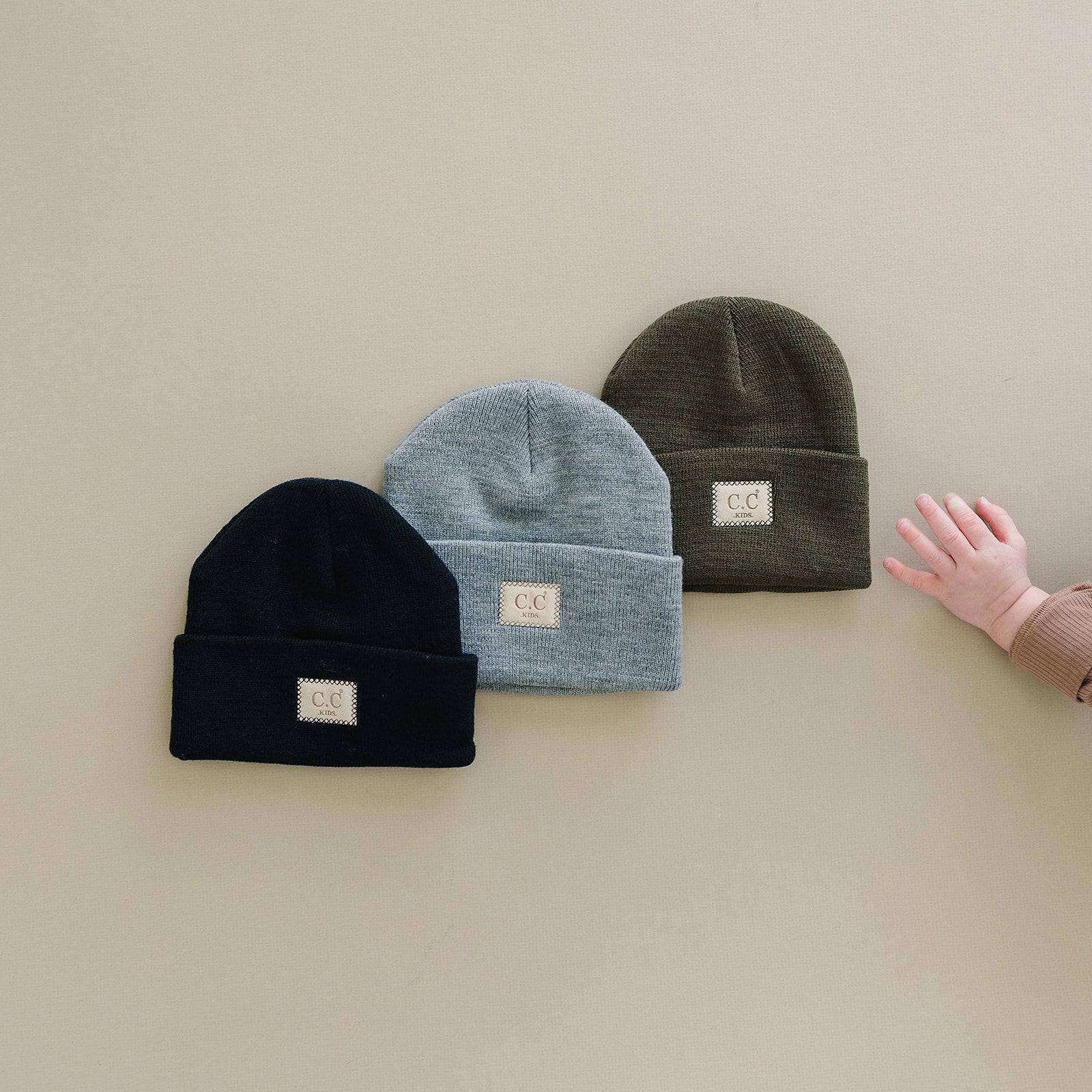 CC Baby Classic Unisex Ribbed Beanie Hats in various colors, showcasing the ribbed texture and C.C branding.
